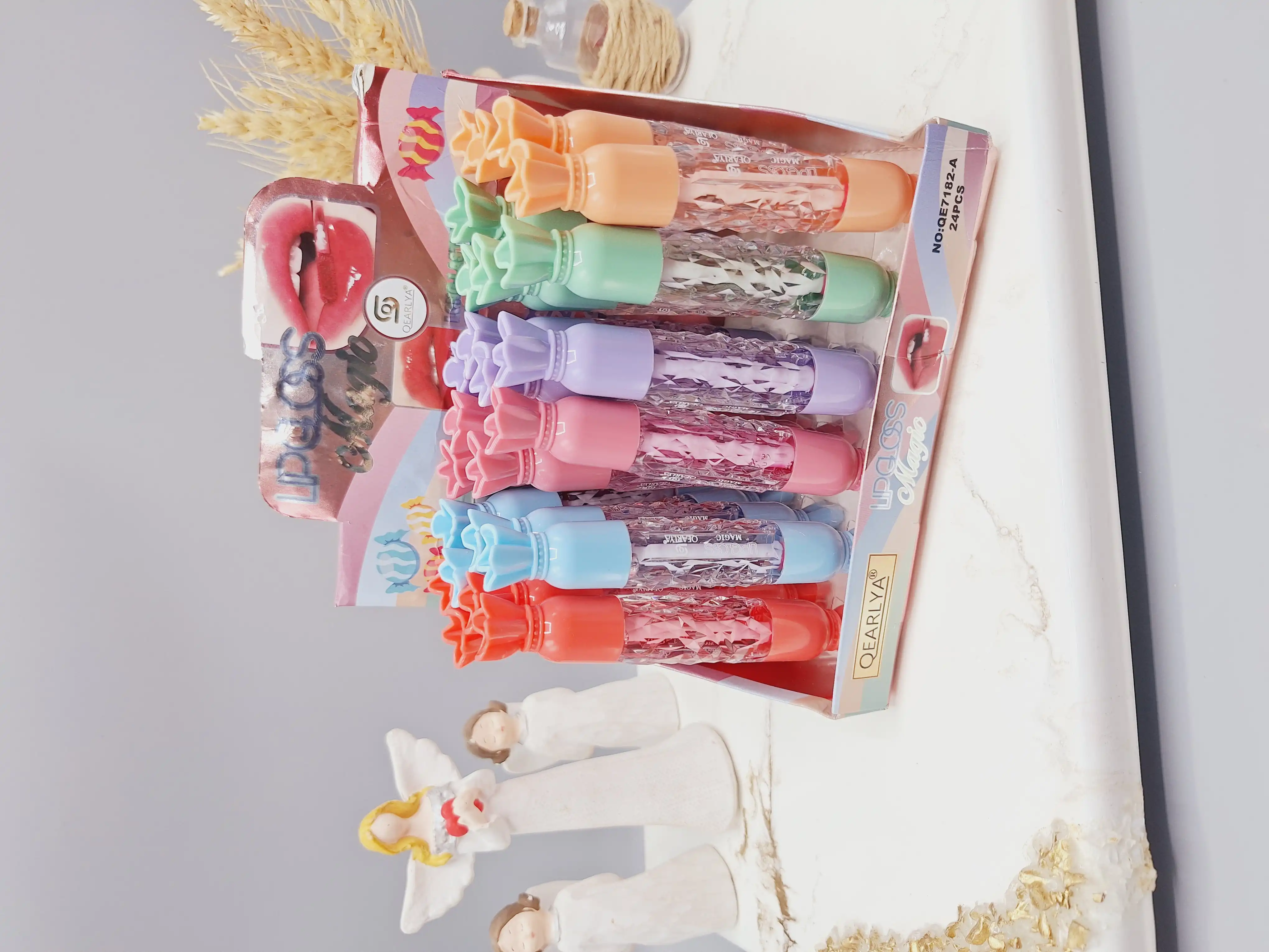 لیپ گلاس فوق العاده زیبا طرح هویج پیچی برند QEARLYA کد NO:QE7182-A