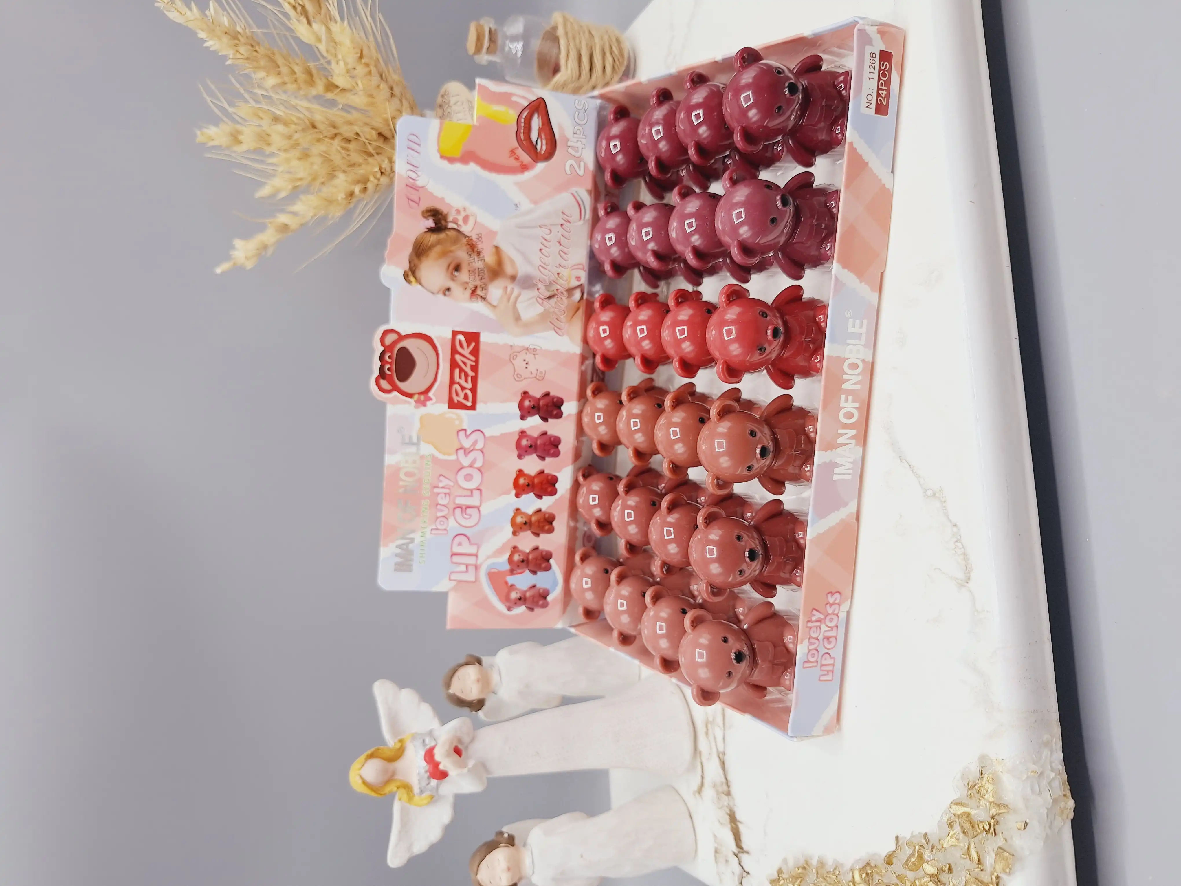 پک 6 تایی رژ مایع جاکلیدی طرح خرسی برند IMAN OF NOBLE کد 11268B