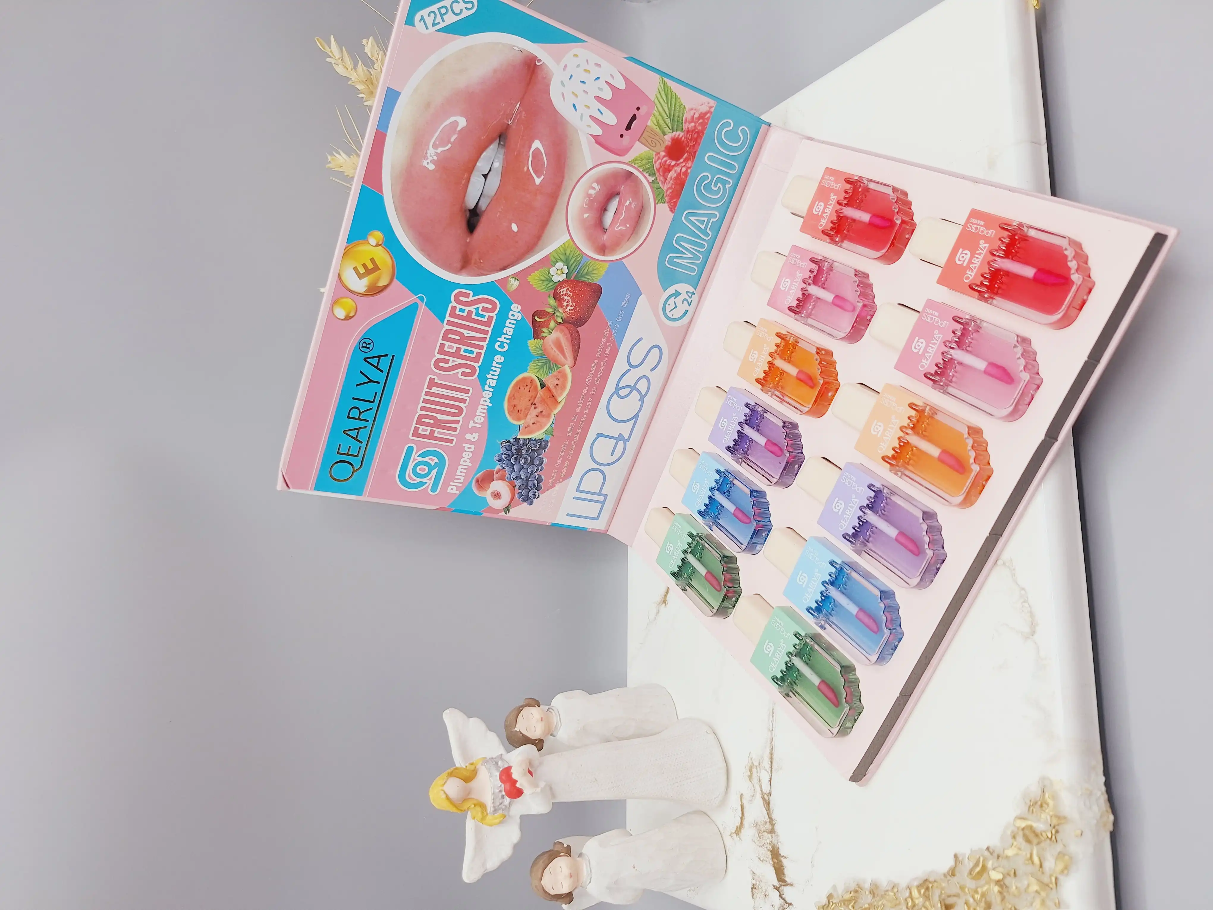 پک 12 تایی فوق العاده زیبا برق لب بستنی با رایحه های میوه ای برند MAGIC کد  QE7116