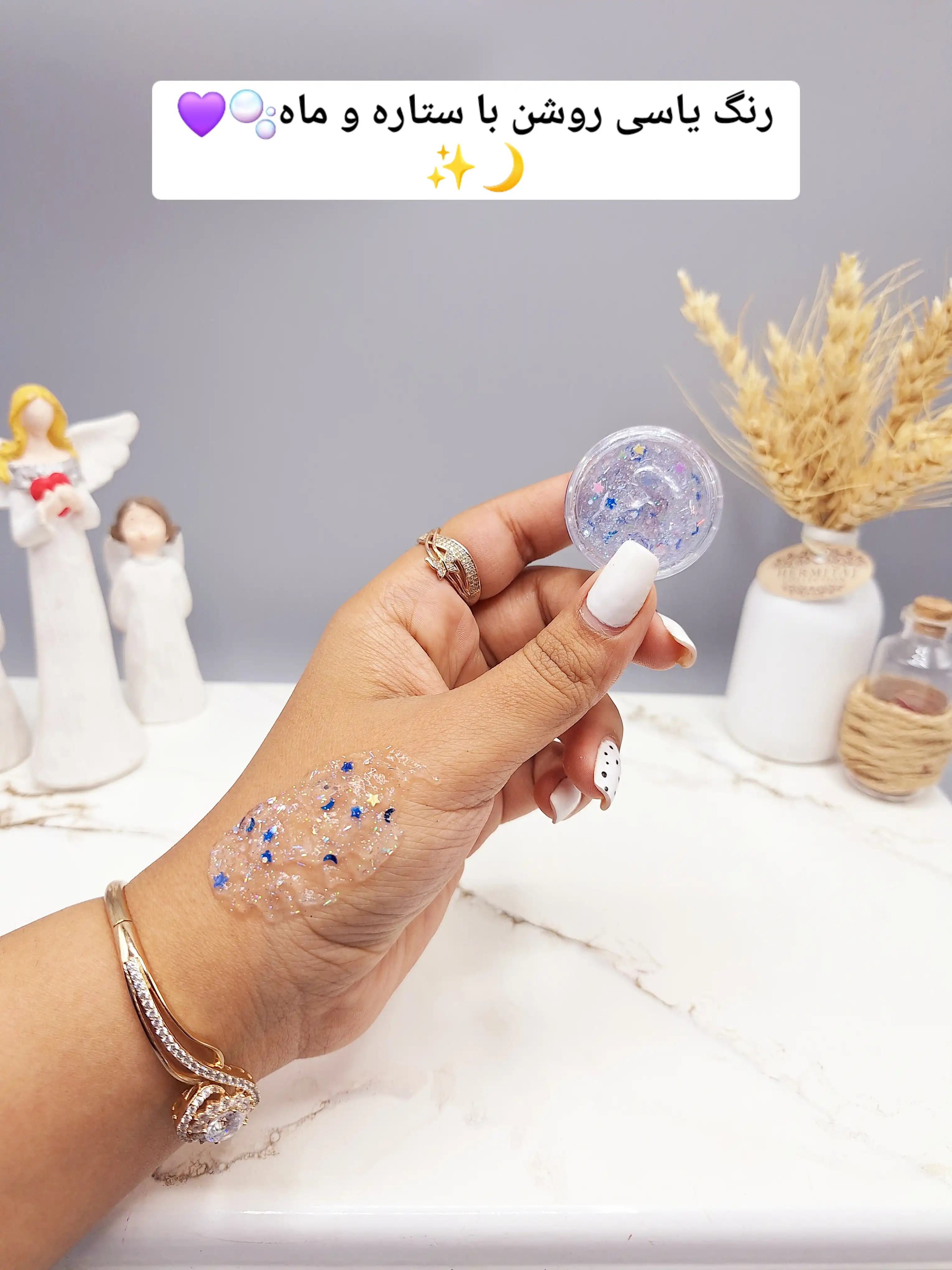 گلیتر مایع رنگ یاسی با ستاره آبی