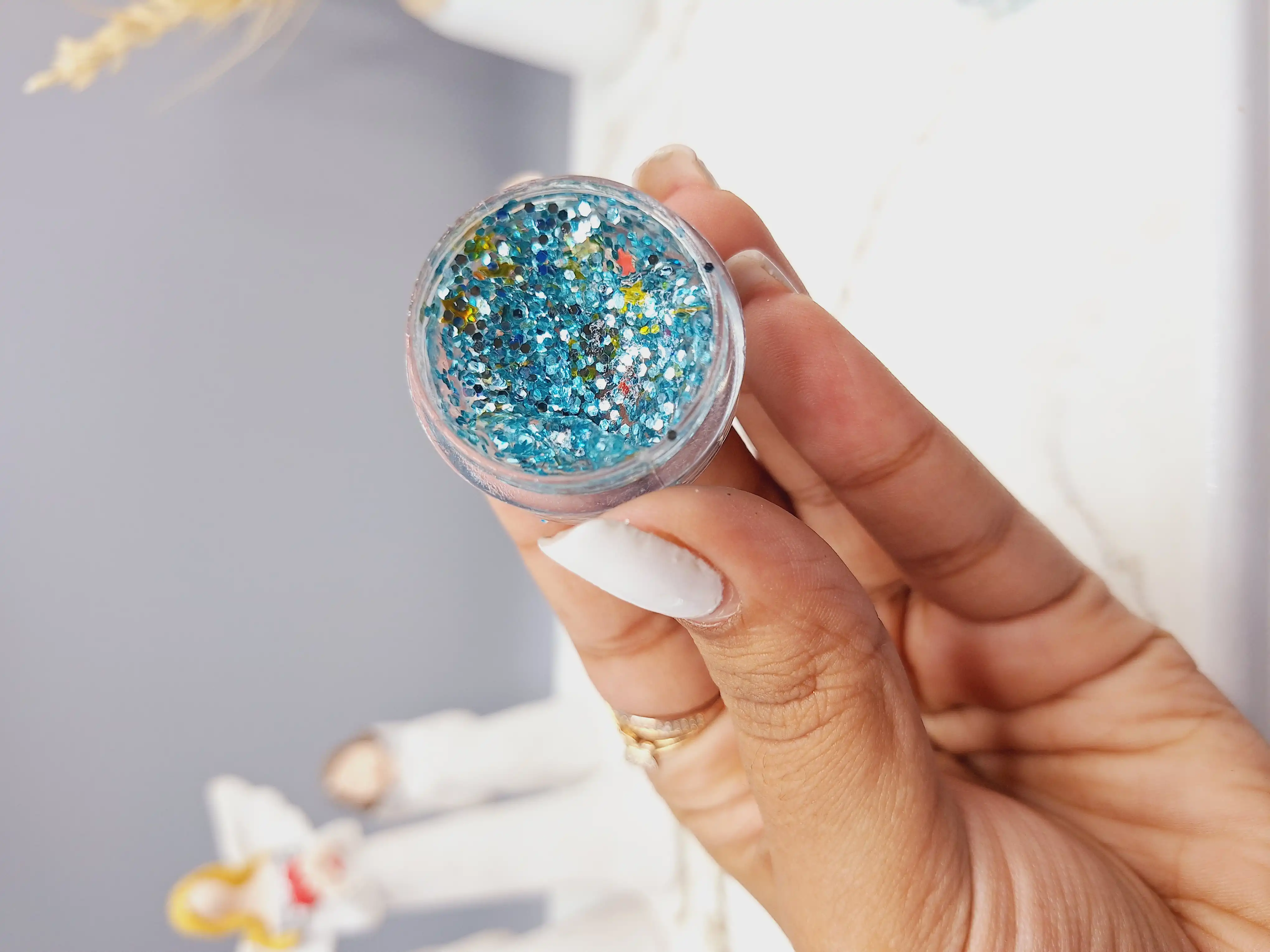گلیتر مایع رنگ آبی فیروزه ای
