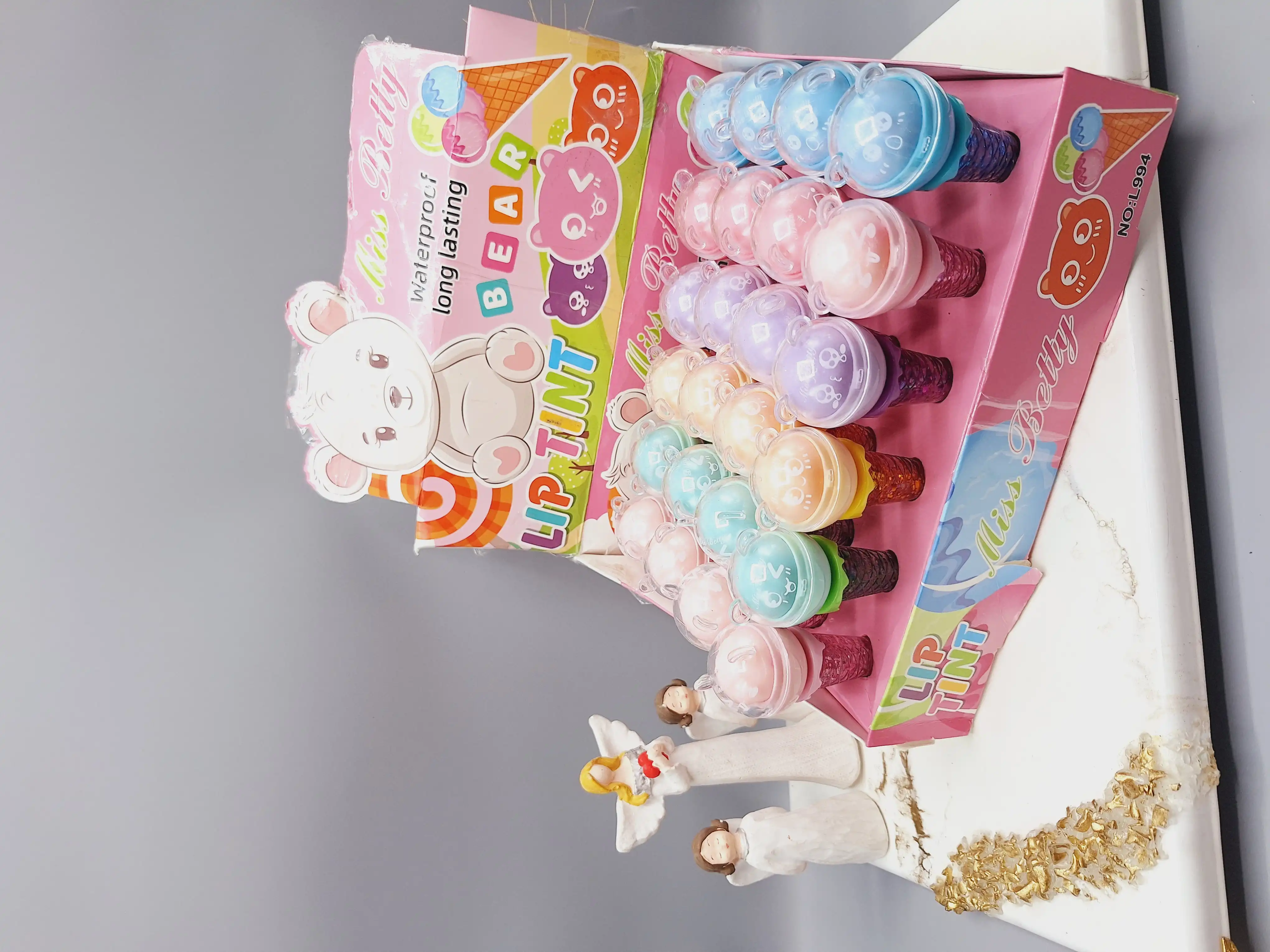 لیپ گلاس شاین دار و بالم لب برند Miss Belly کد NO:L994