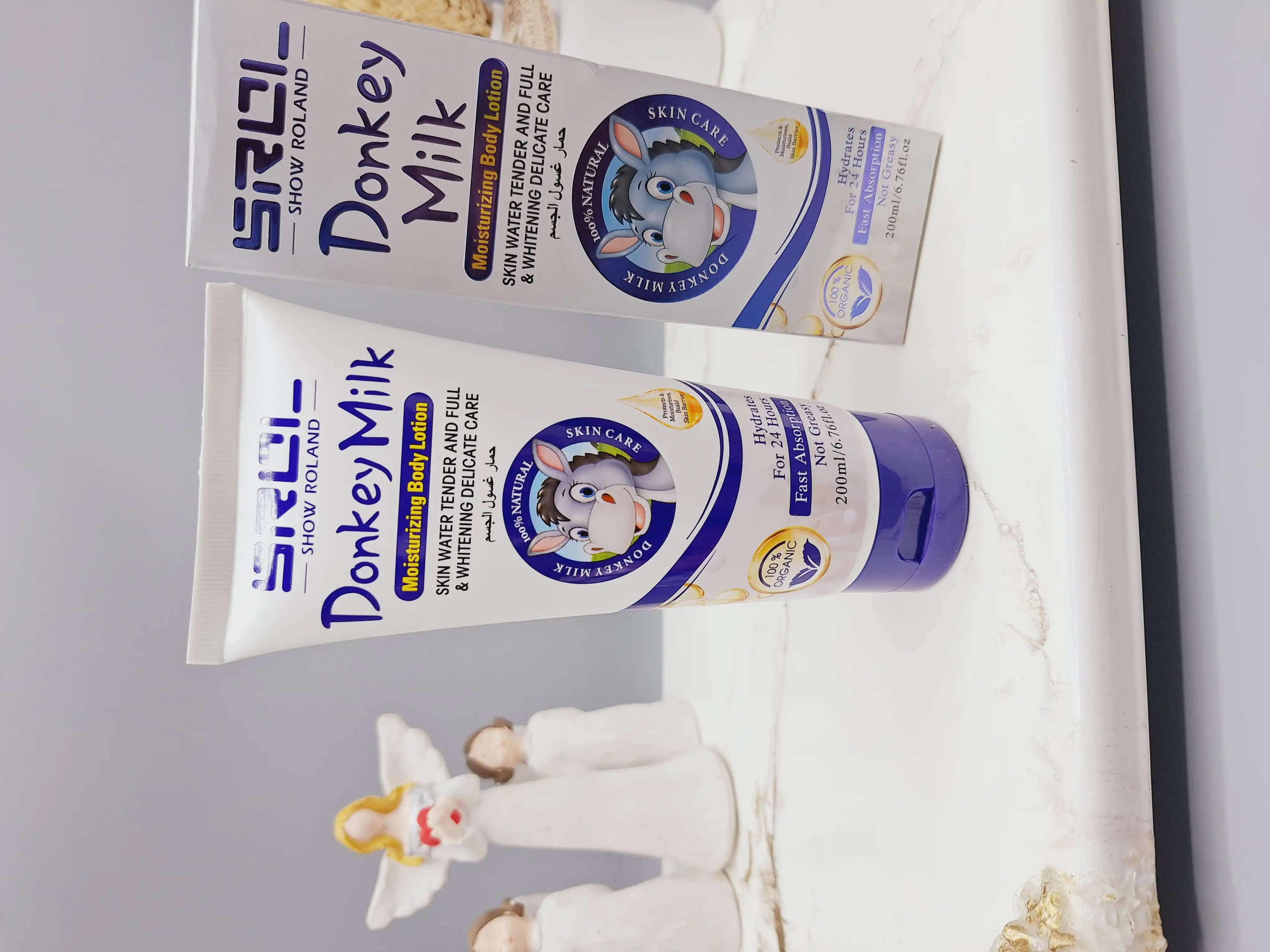 لوسیون شیر الاغ آبی سفید کننده بدن ‏SHOW ROLAND‏ کد R208