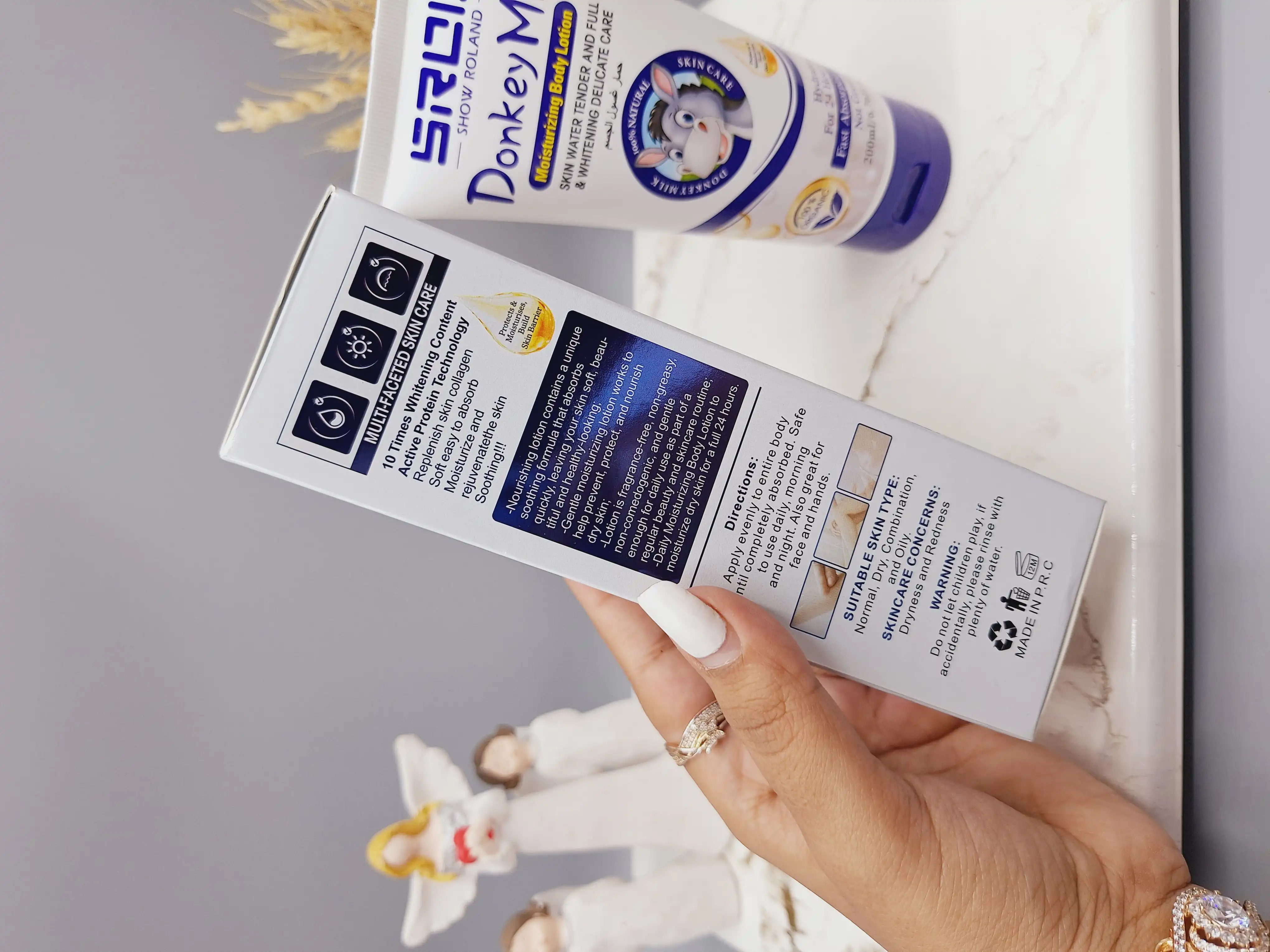 لوسیون شیر الاغ آبی سفید کننده بدن ‏SHOW ROLAND‏ کد R208