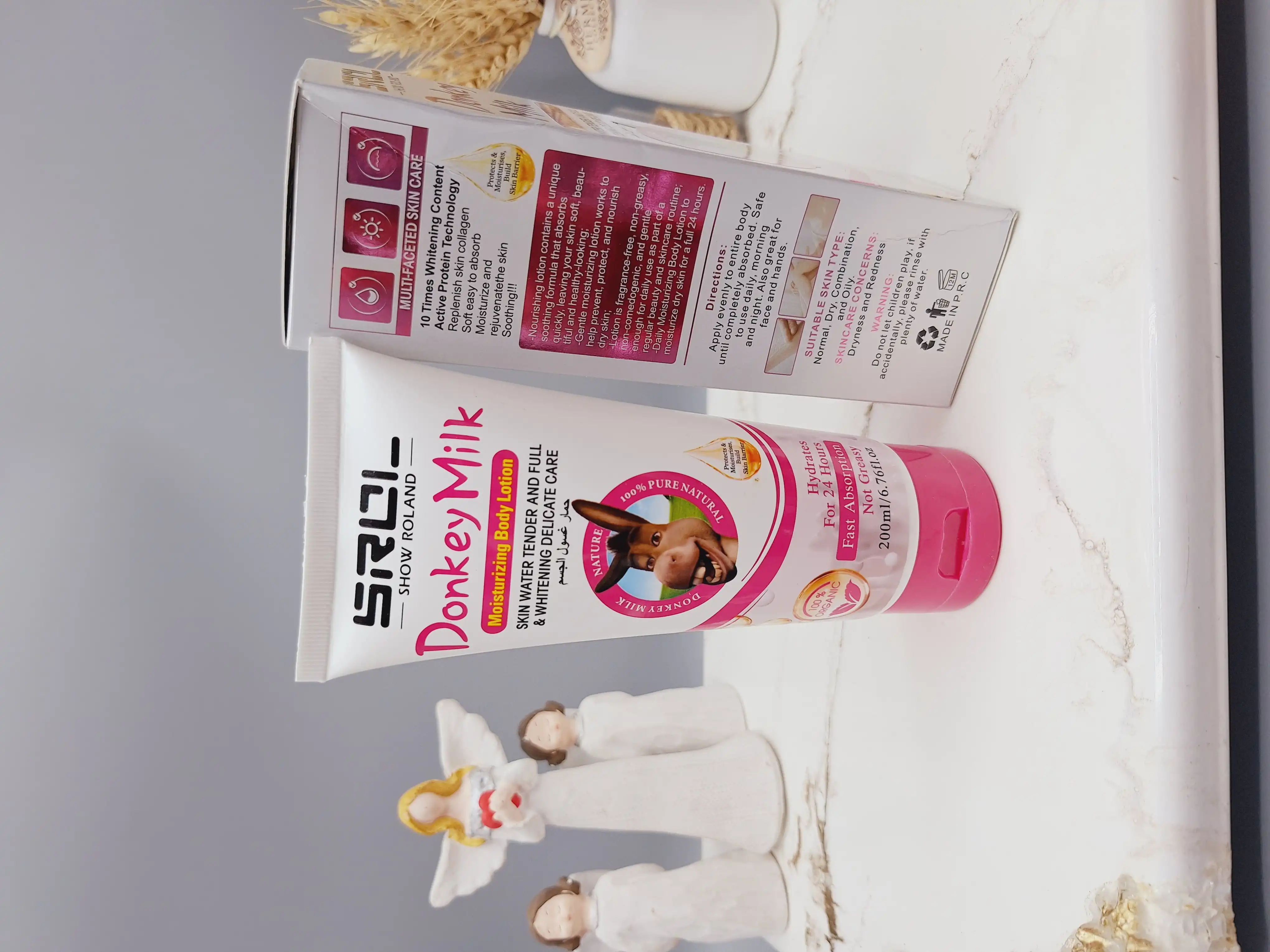 لوسیون شیر الاغ صورتی سفید کننده بدن ‏SHOW ROLAND‏ کد R209