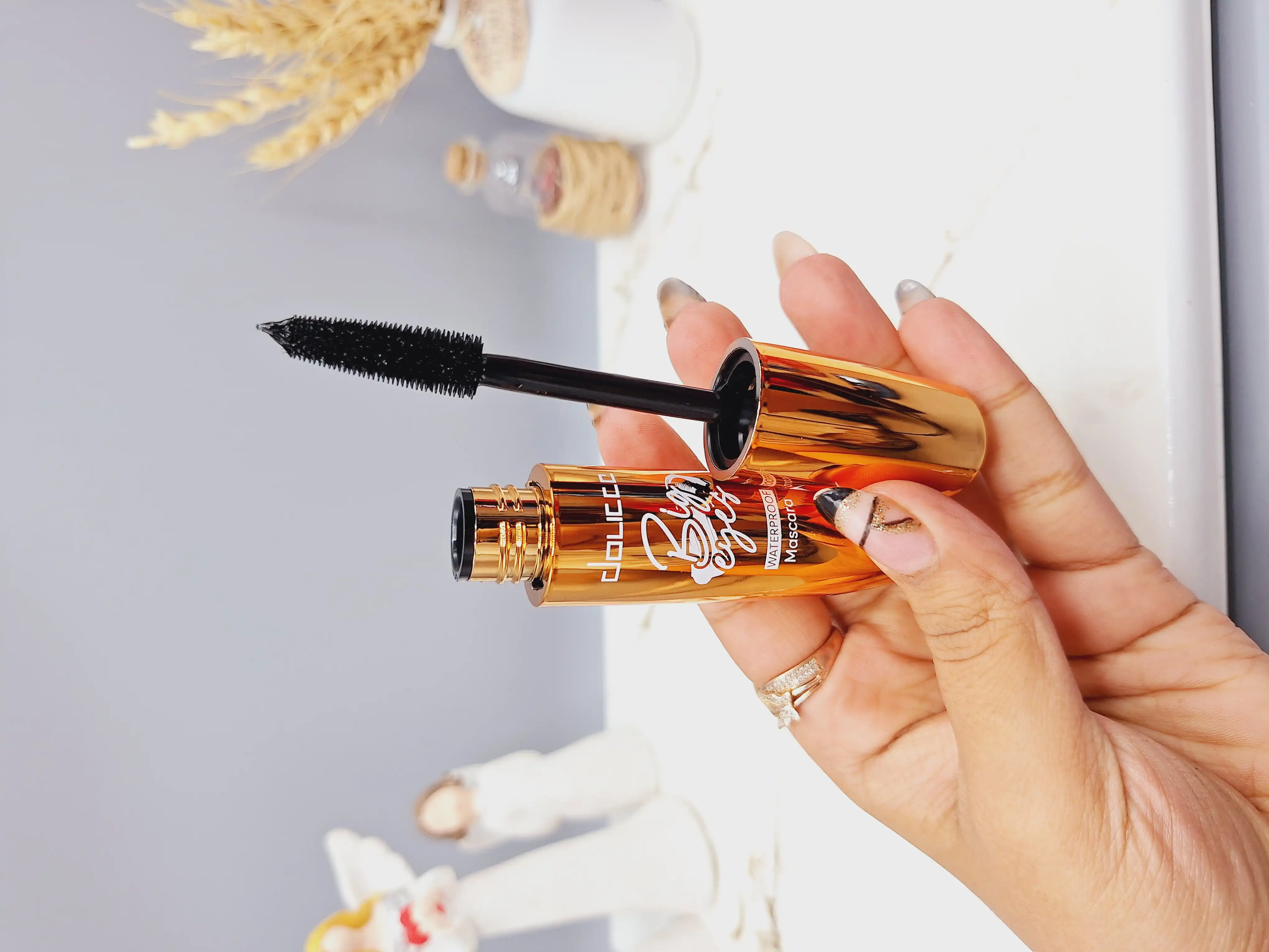 ریمل حجم دهنده و بلند کننده پوکه رنگی دوسه doucce کد 9531