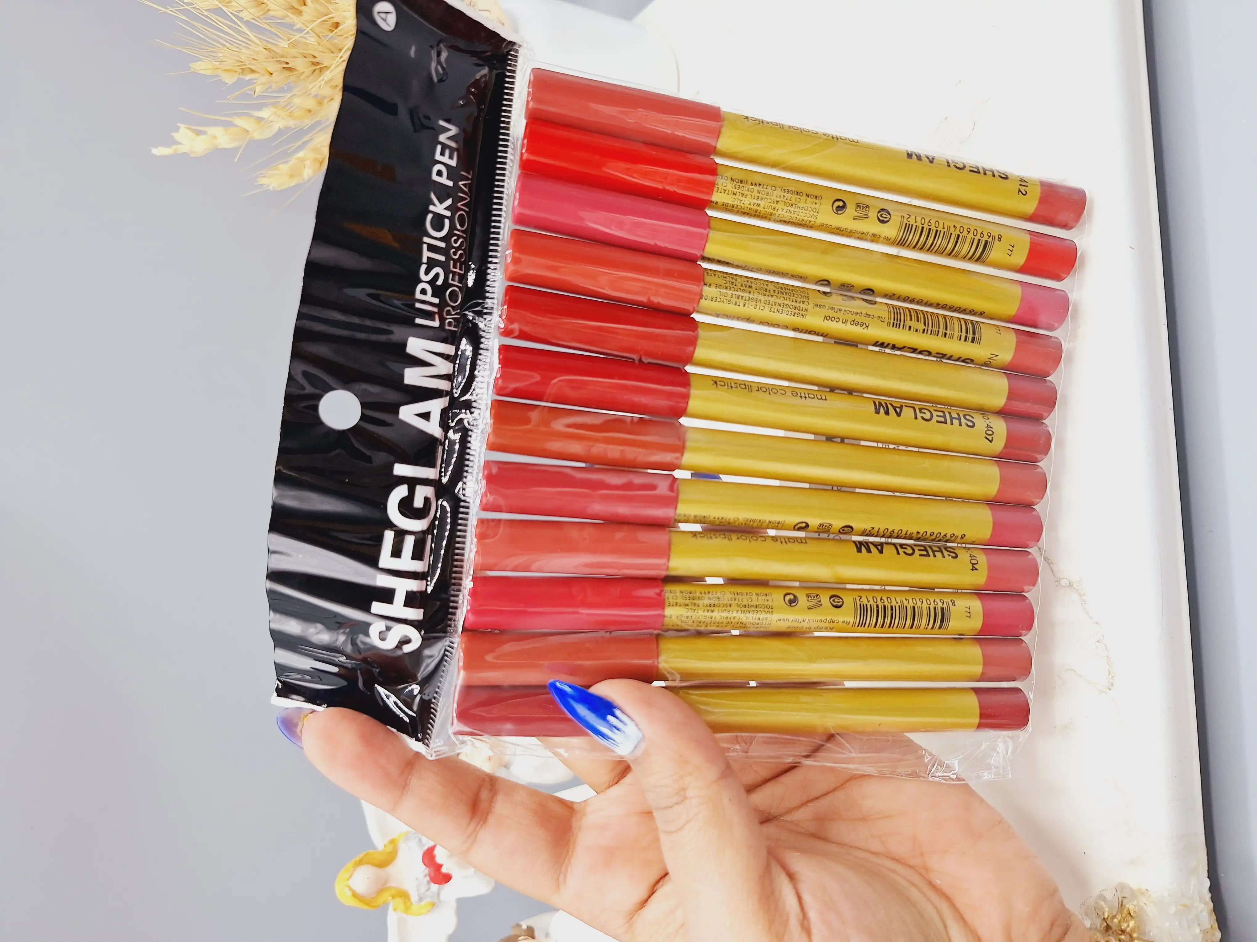 پک رژ مدادی 12 تایی برند شیگلم کد 2619 پوکه طلایی