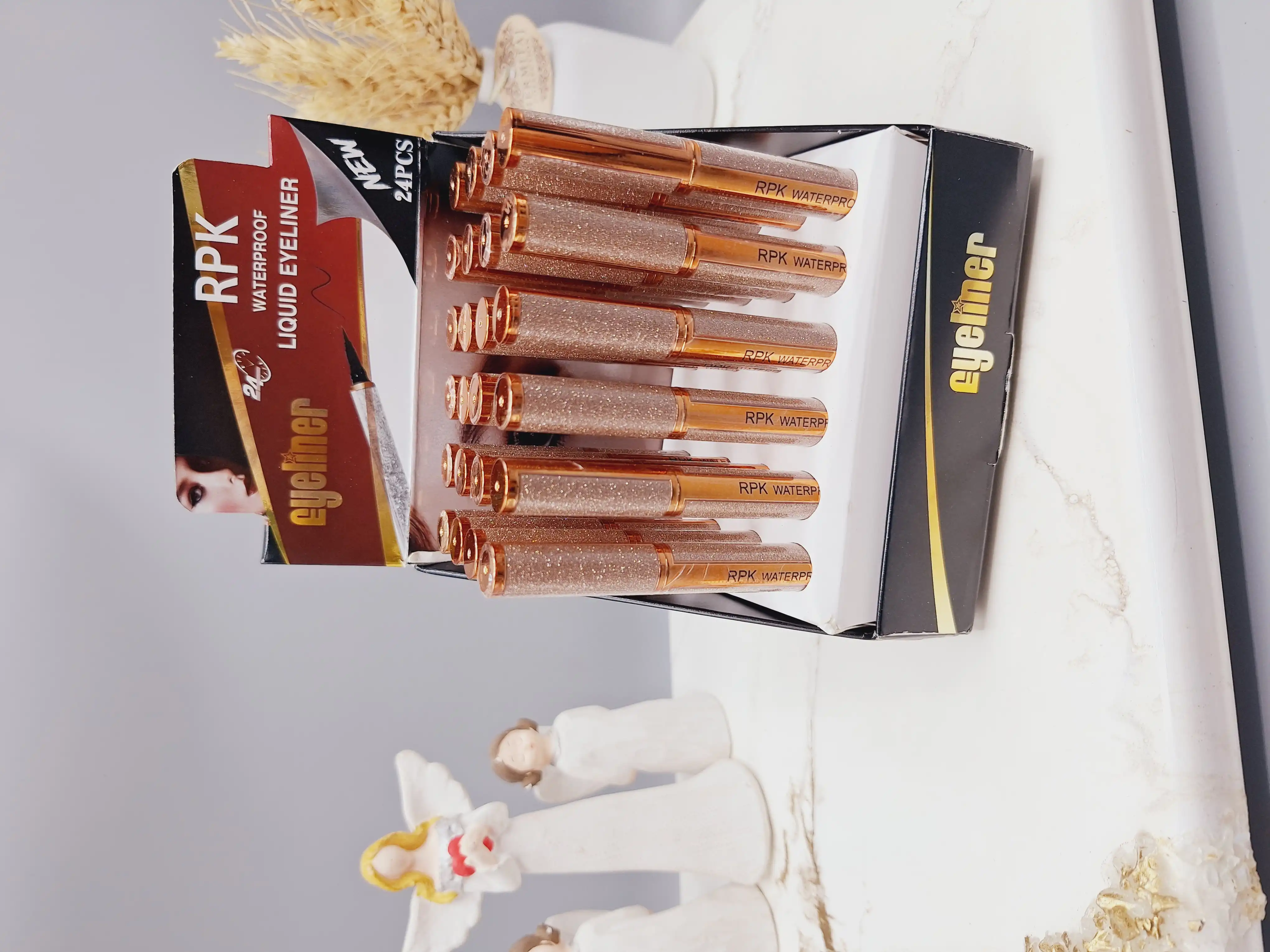 خط چشم مشکی ماژیکی پوکه طلایی برند RPK کد 8052