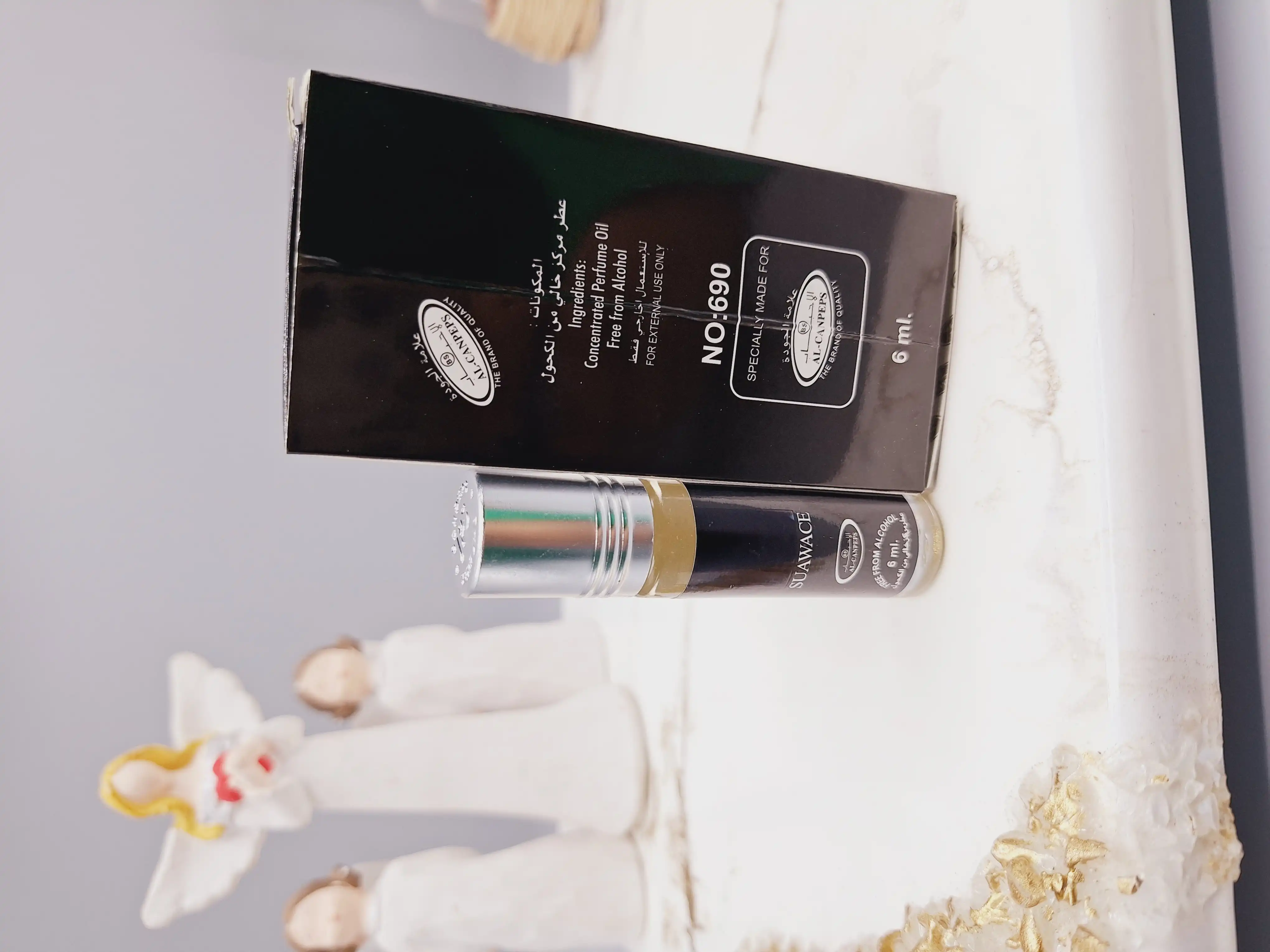 عطر 6 میل بدون الکل مدل SUAWACE مردانه کد 690