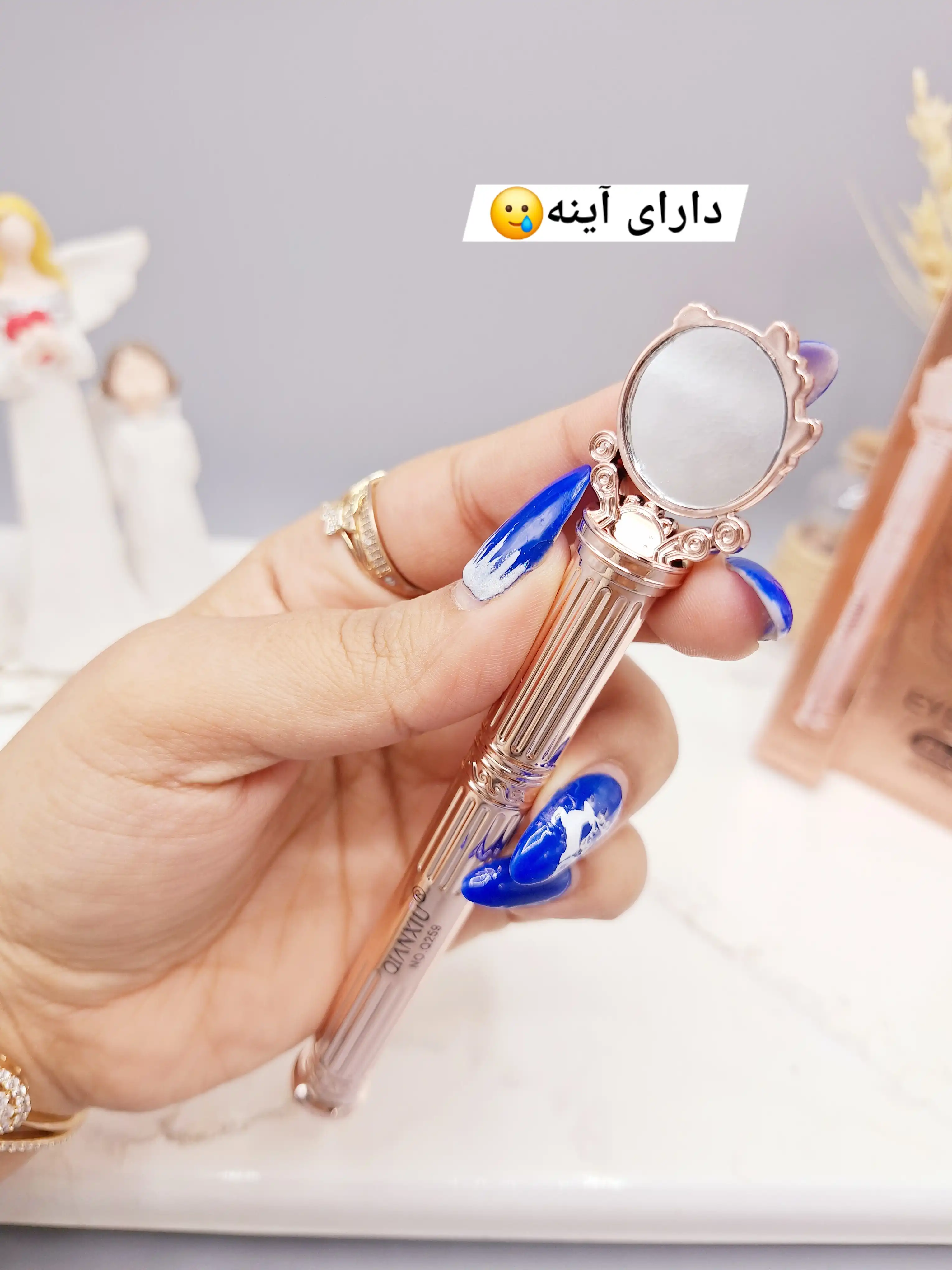 خط چشم ماژیکی ضد آب سلطنتی طرح طاووس همراه آینه فوق لاکچری برند ‏QIANXIU‏ کد 259