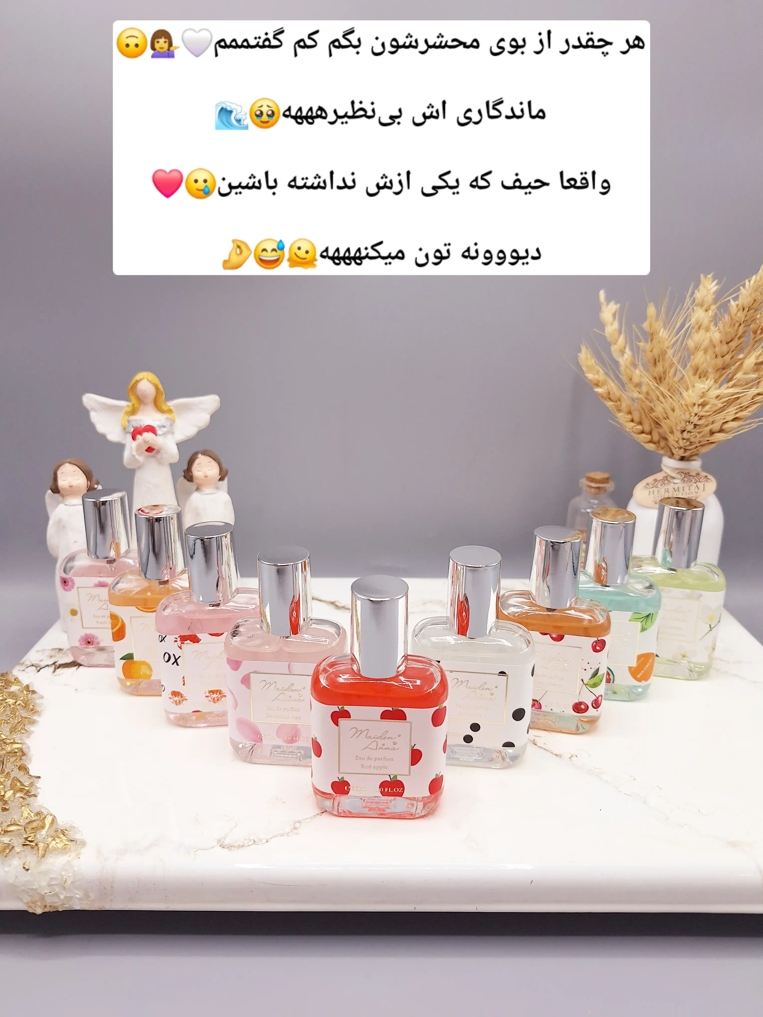 عطر مینی فانتزی دخترانه 30میل مدل گلهای داوودی ساخت چین کد YT-5297-7