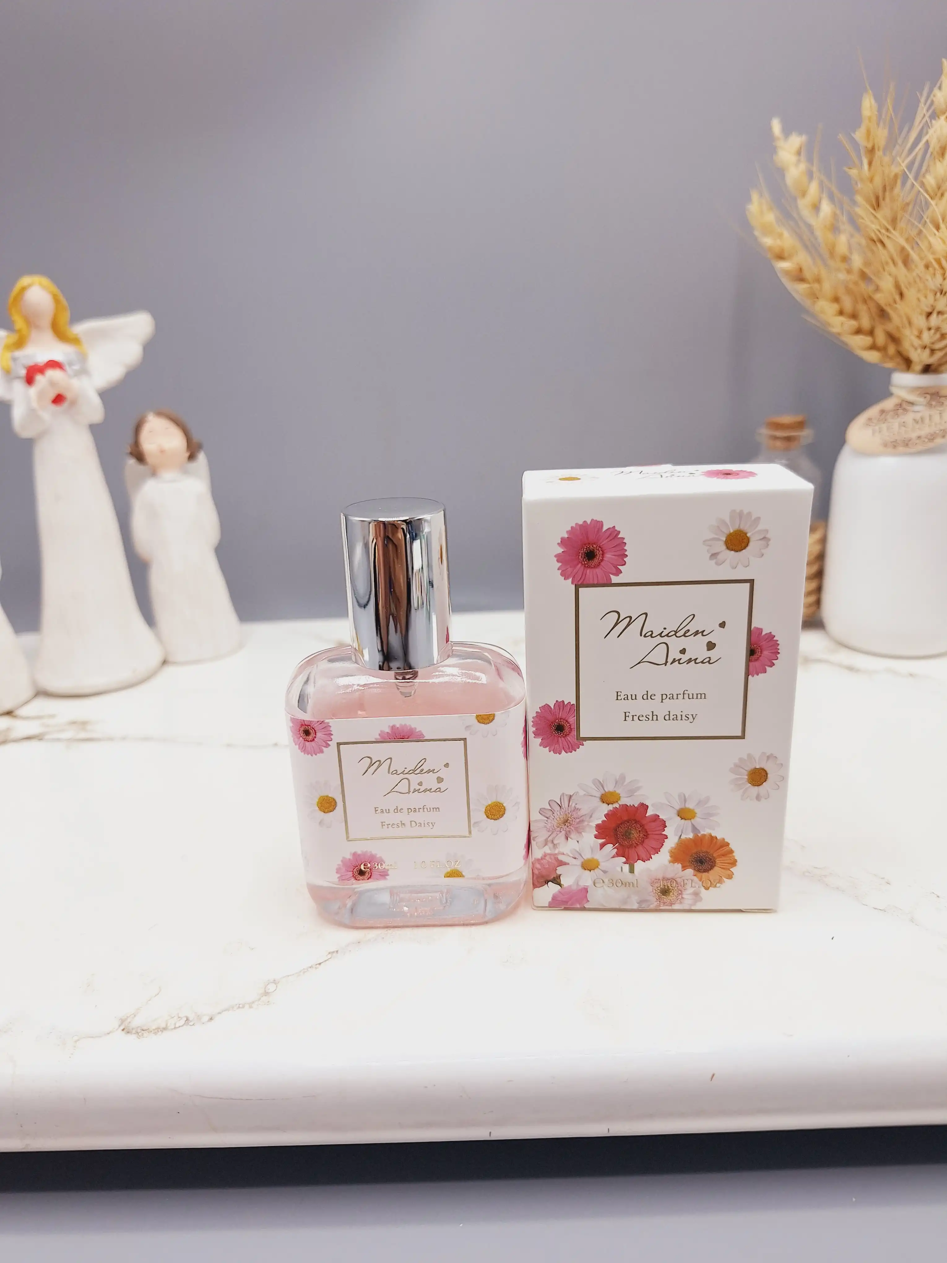 عطر مینی فانتزی دخترانه 30میل مدل گلهای داوودی ساخت چین کد YT-5297-7