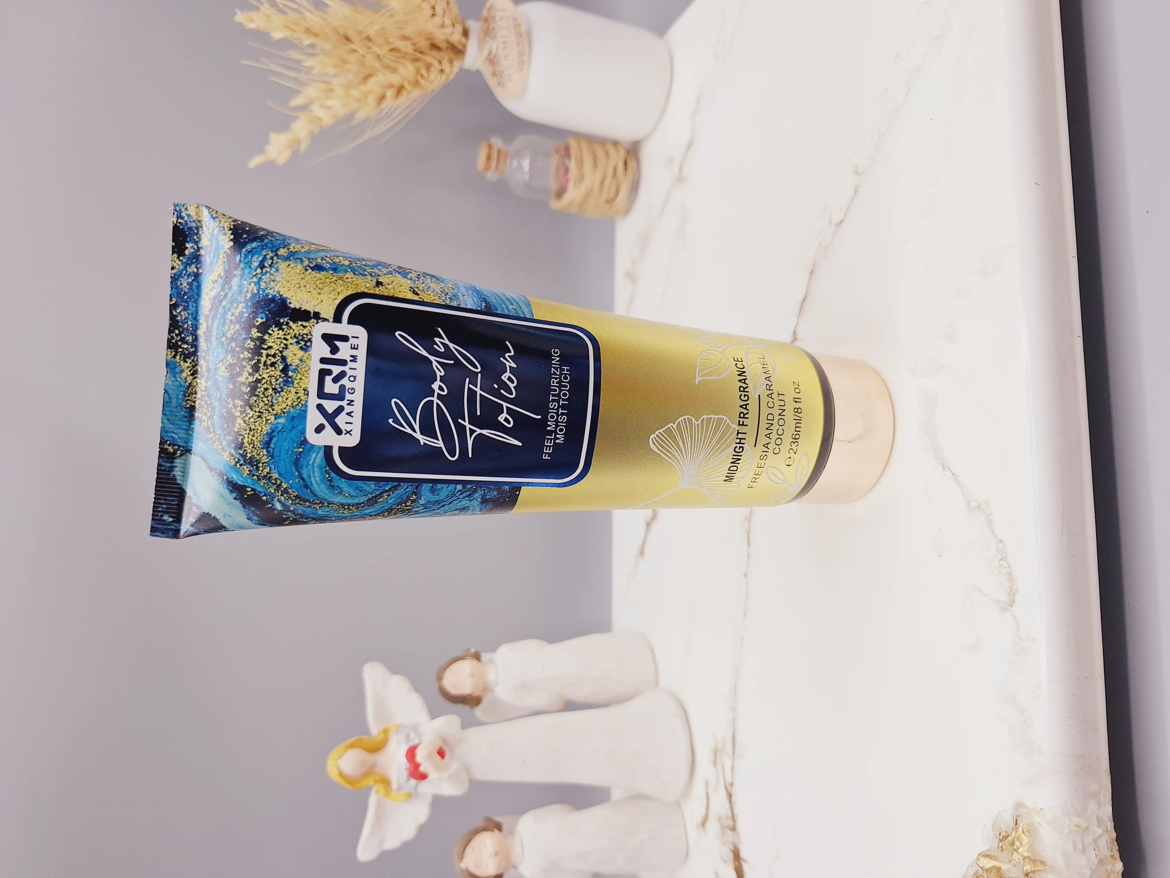 لوسیون بدن XQM حاوی ترکیبات مرطوب کننده و نرم کننده کد 0360