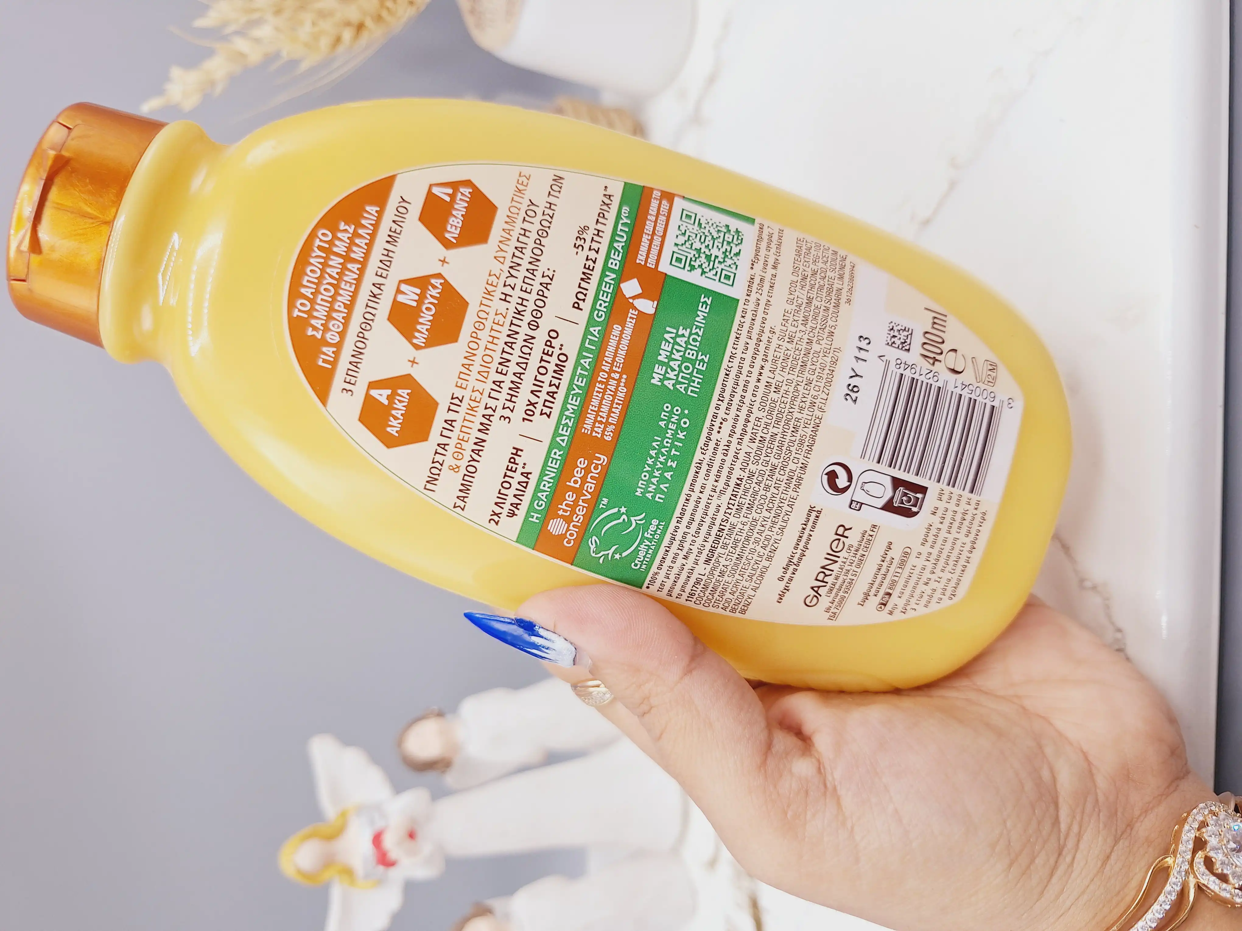 شامپو ترمیم کننده گیاهی و درمانی گنجینه های عسل برند گارنیر اصلی حجم 400 میل کد 1948