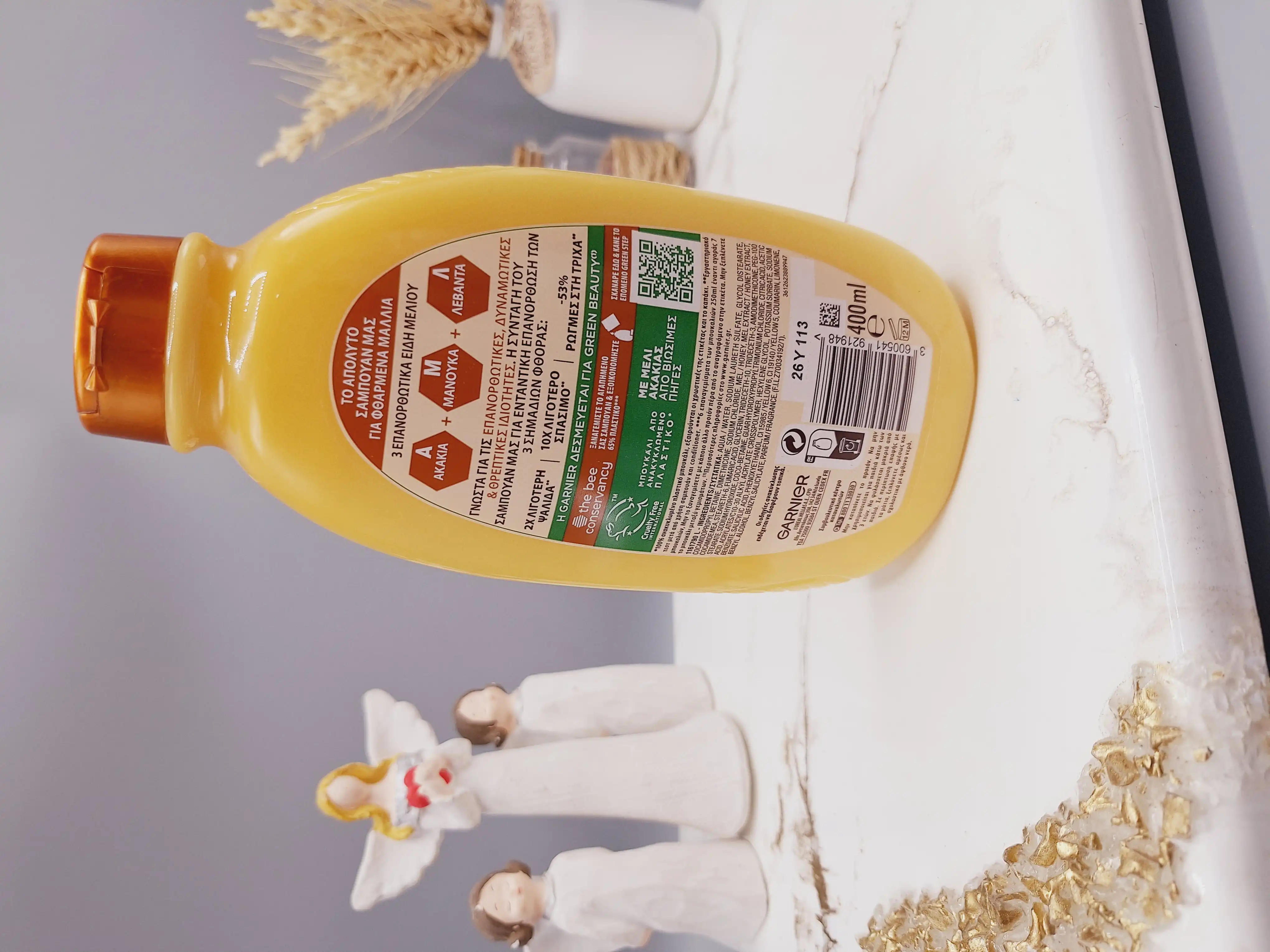 شامپو ترمیم کننده گیاهی و درمانی گنجینه های عسل برند گارنیر اصلی حجم 400 میل کد 1948