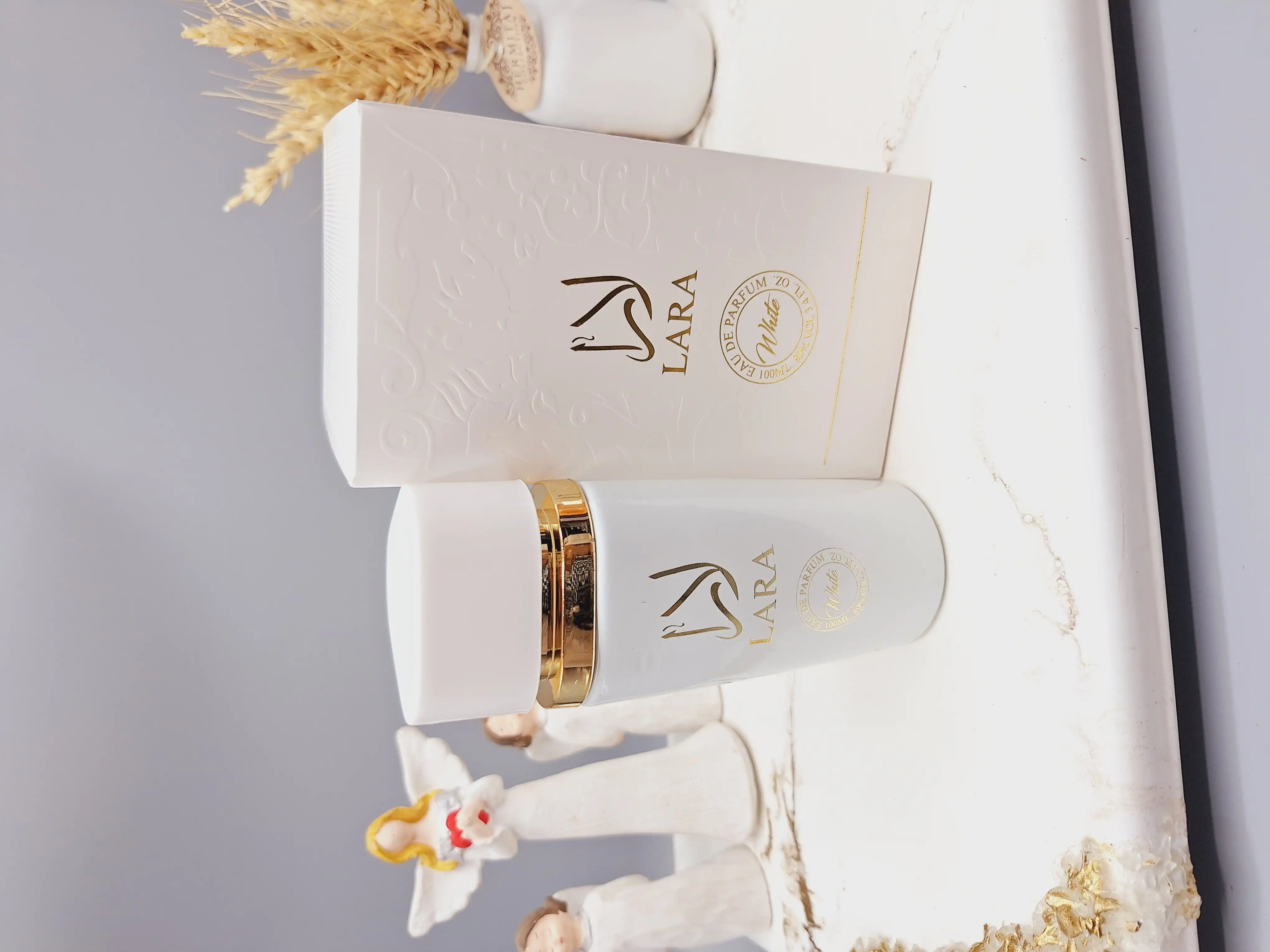 ادکلن زنانه لارا سفید خوشبووو وارداتی حجم 100 میل کد 9057