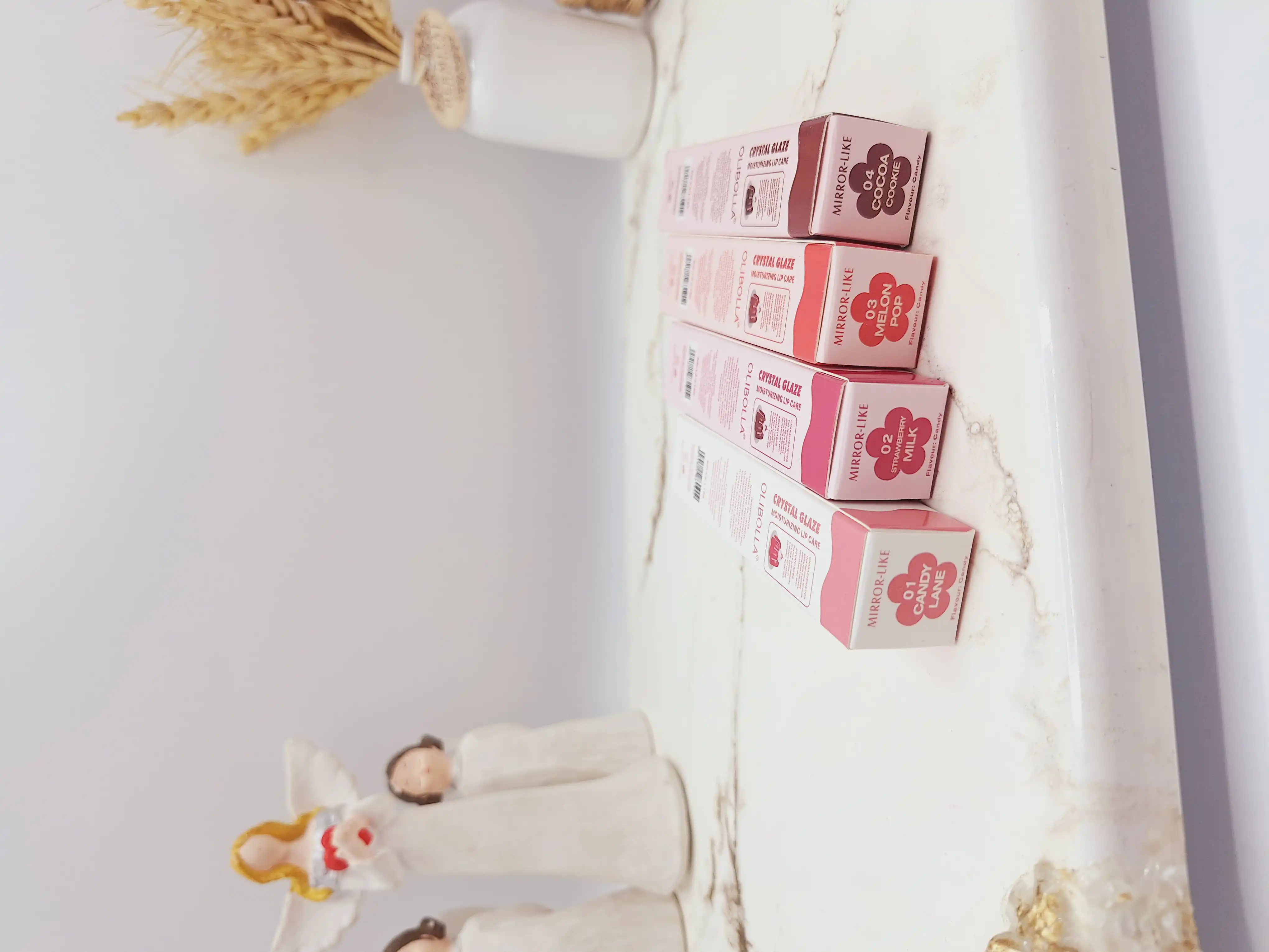 لیپ گلاس شیشه ای برند OLIBOLLA رایحه کیکی کد LA_L190