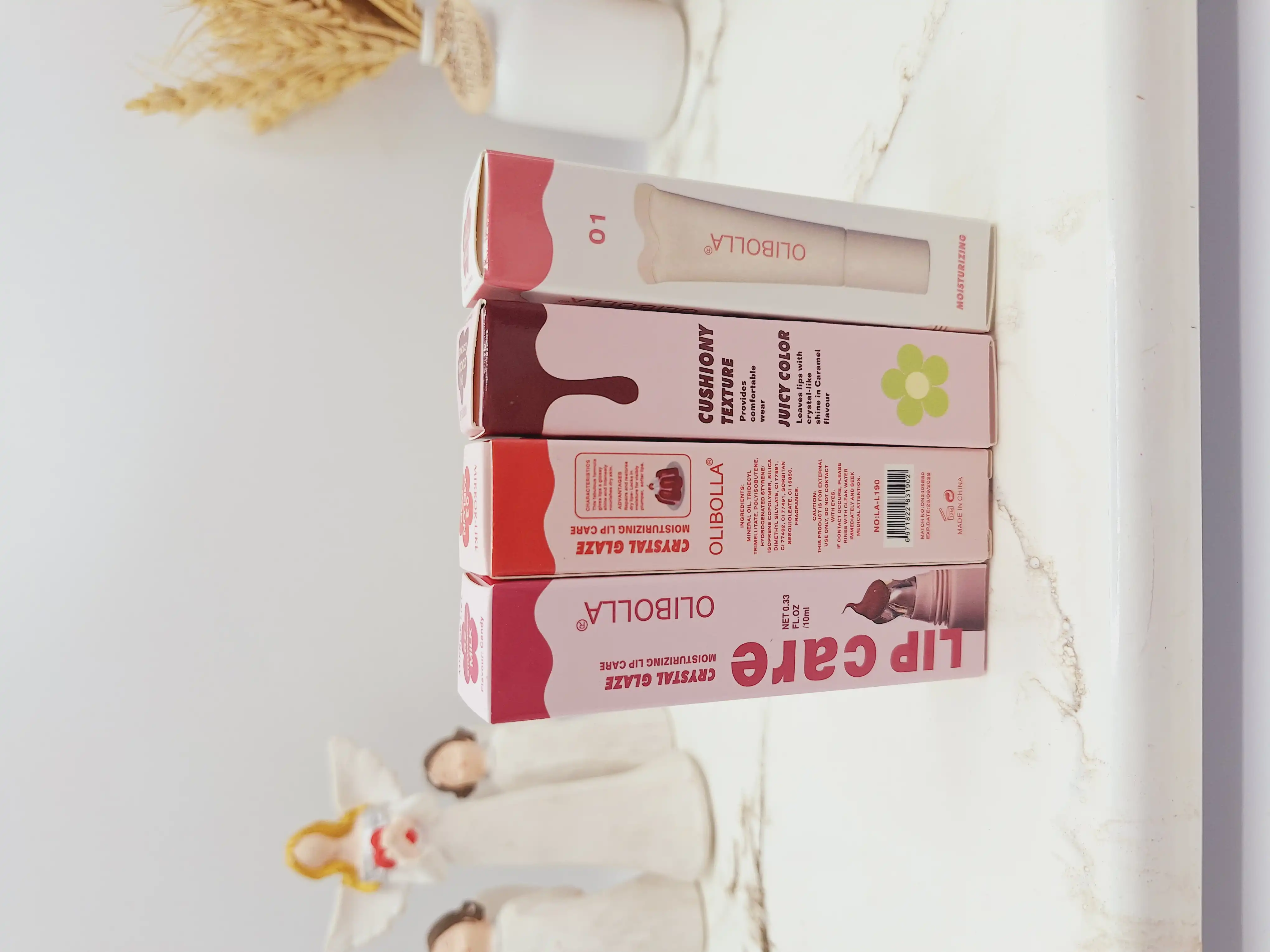 لیپ گلاس شیشه ای برند OLIBOLLA رایحه کیکی کد LA_L190