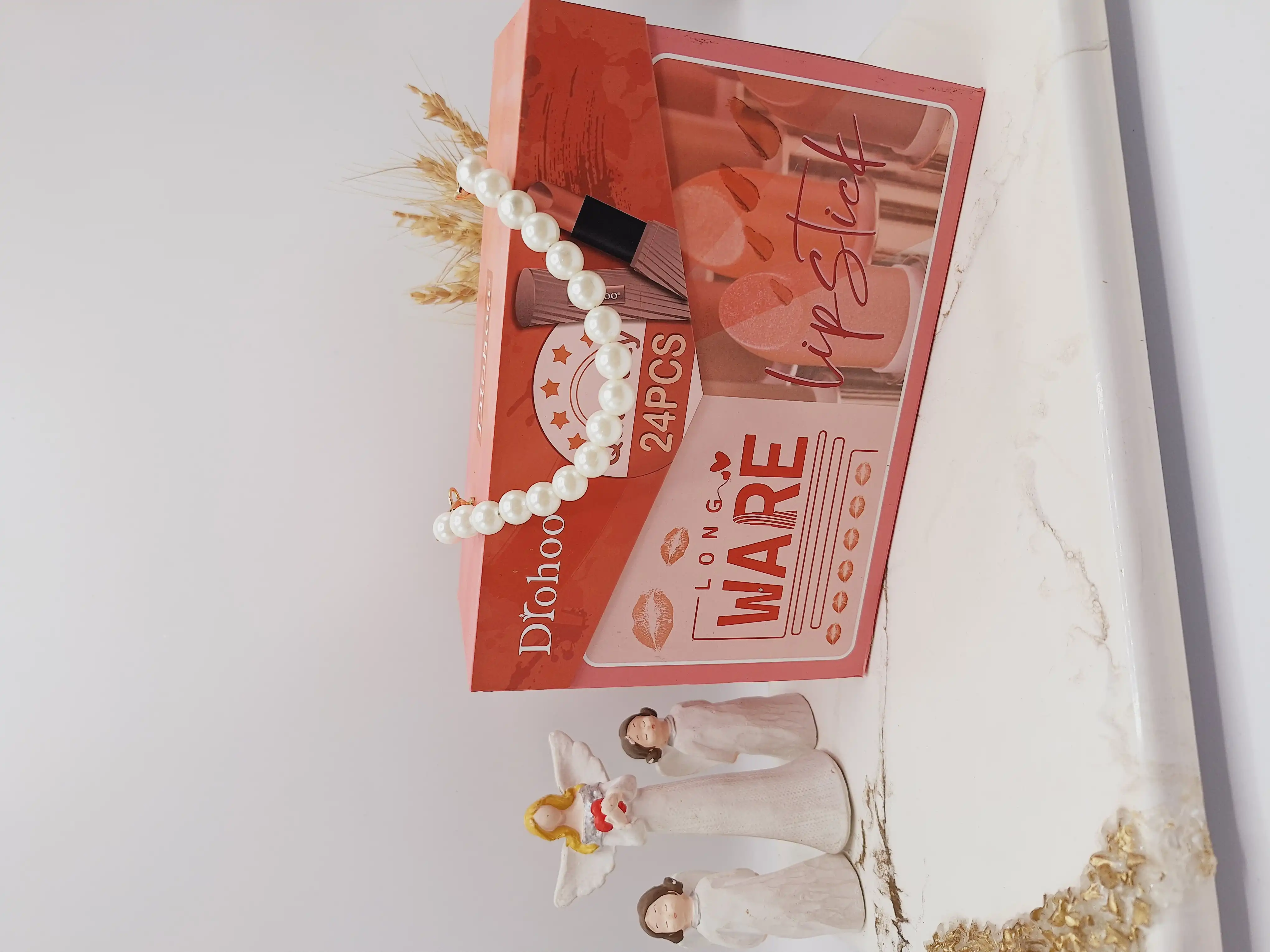 پک رژ 24 تایی مدل کیف زنانه رنگ نود برند دروهو Drohoo کدZY23087