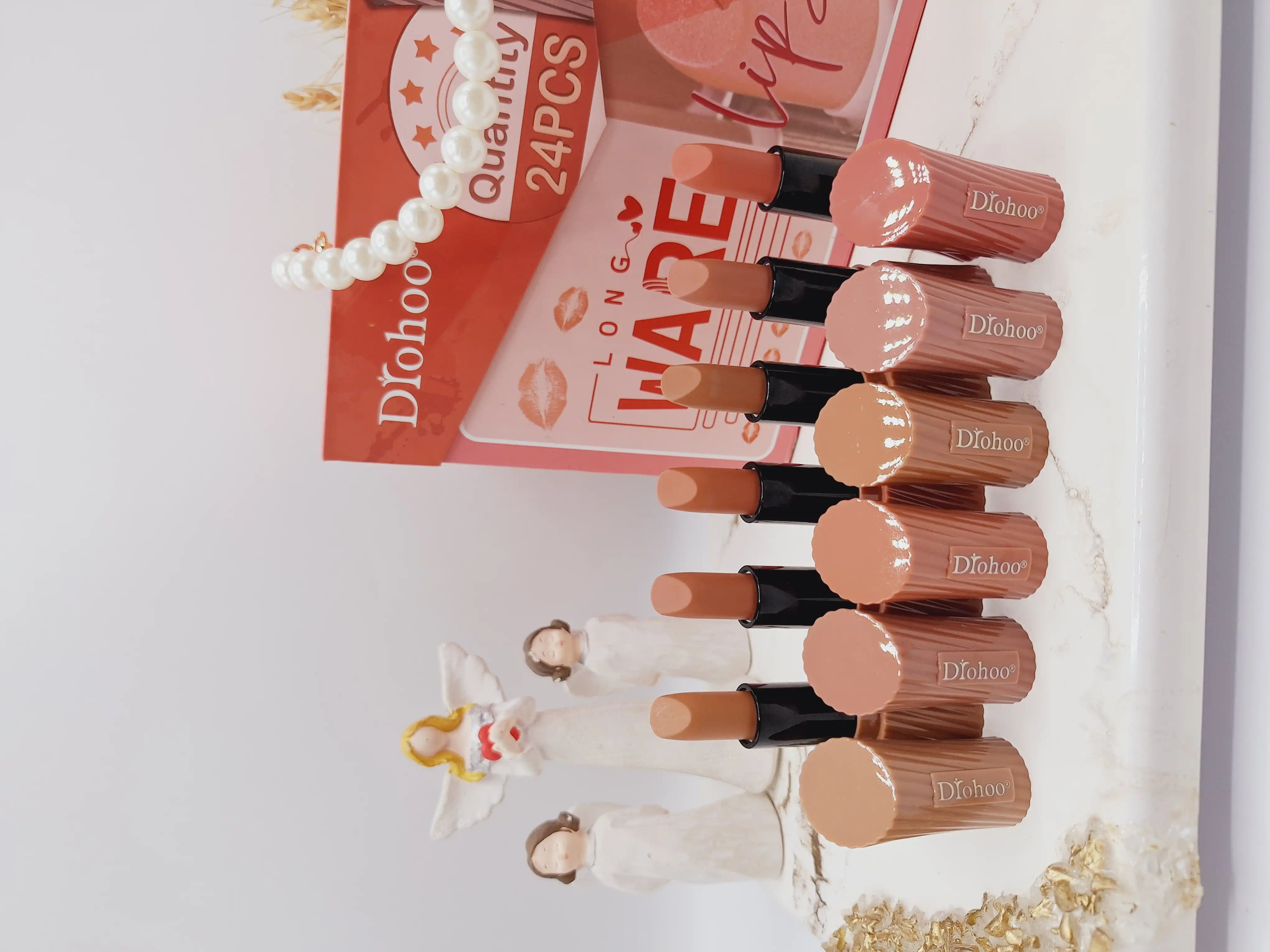 پک رژ 24 تایی مدل کیف زنانه رنگ نود برند دروهو Drohoo کدZY23087