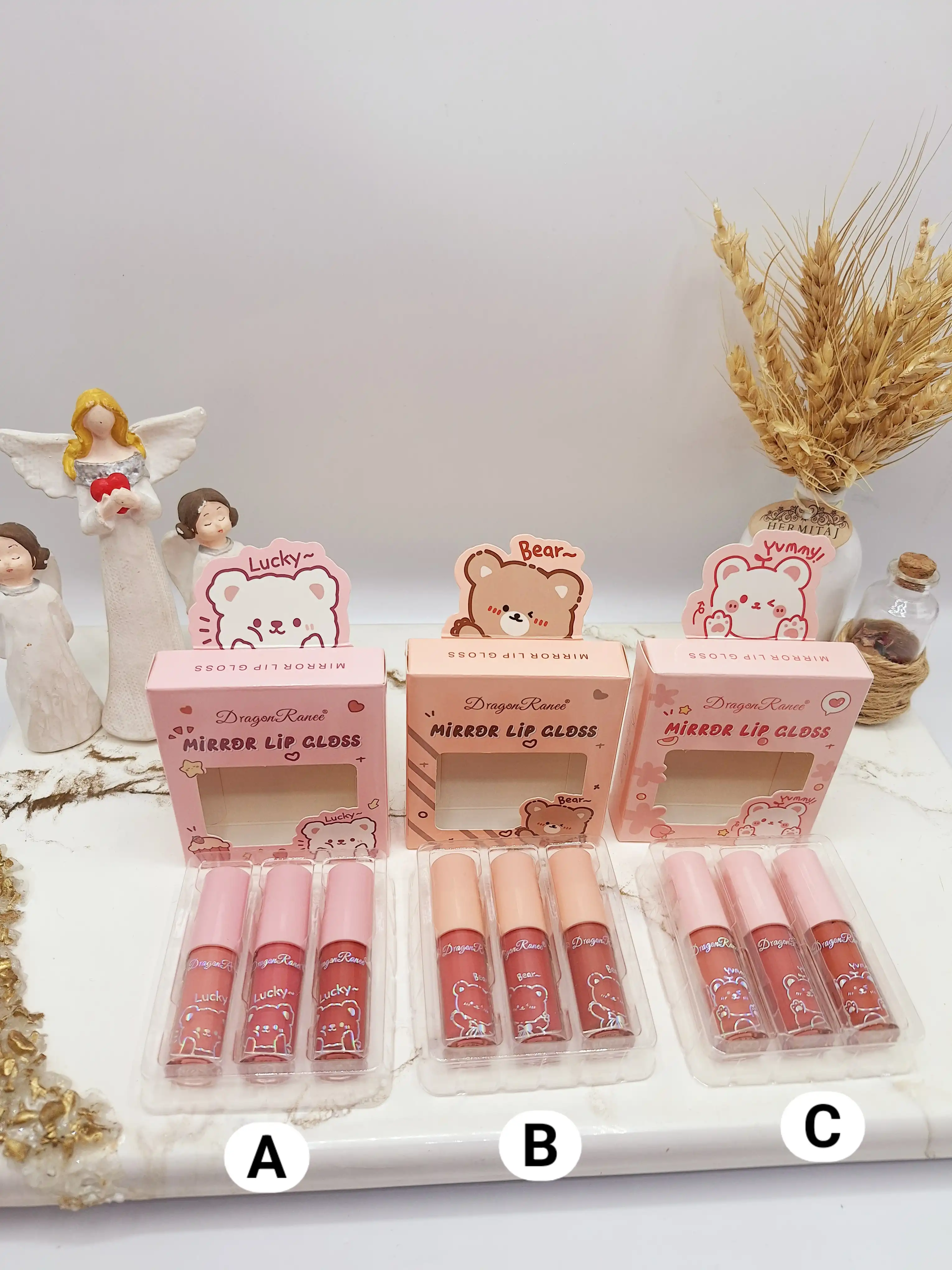 پک سه عددی رژ لب خیس خرسی دراگون رانی کد 5219