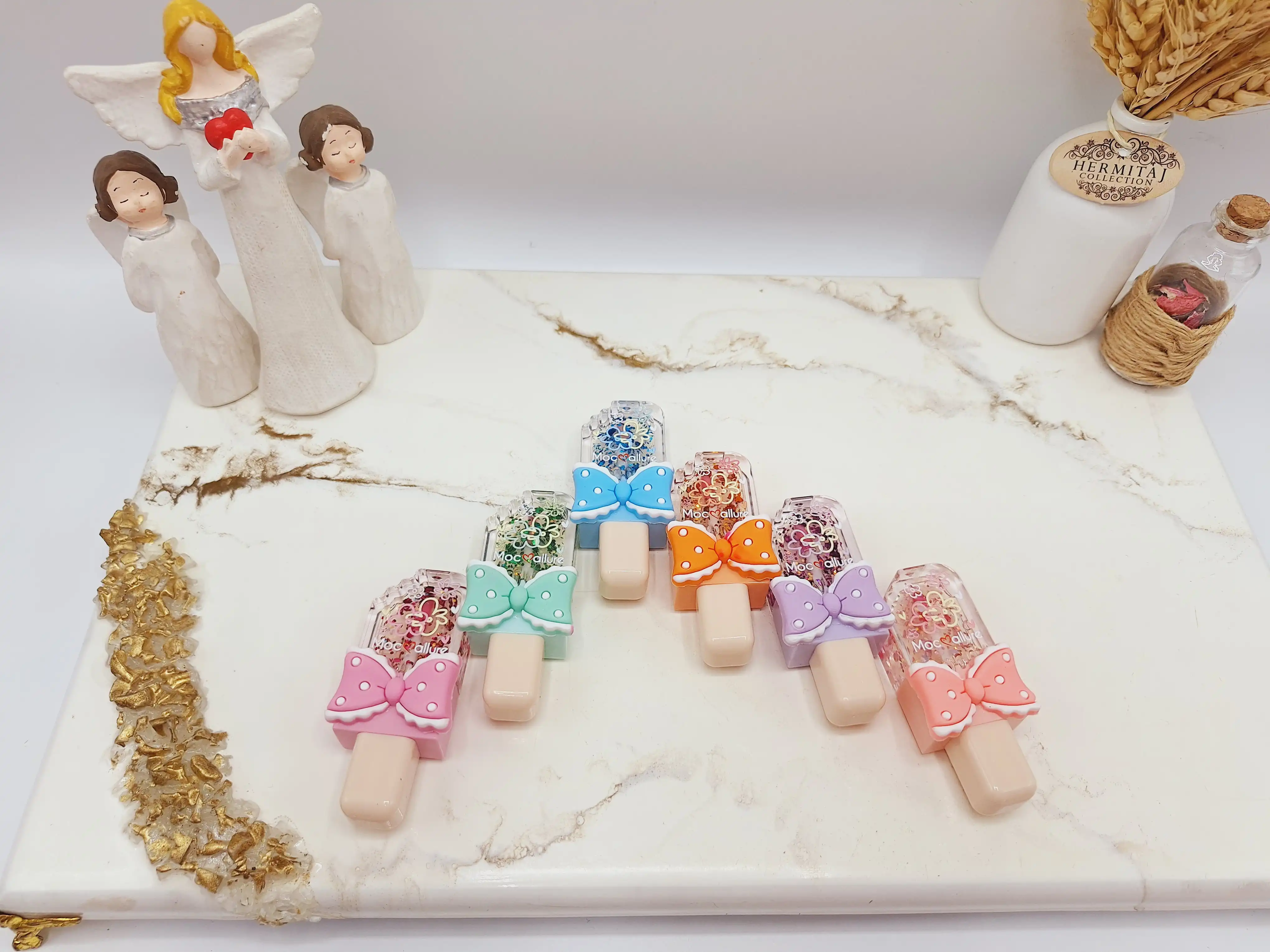 لیپ گلاس شاین دار طرح بستنی پاپیون برند موکالره کد 1082