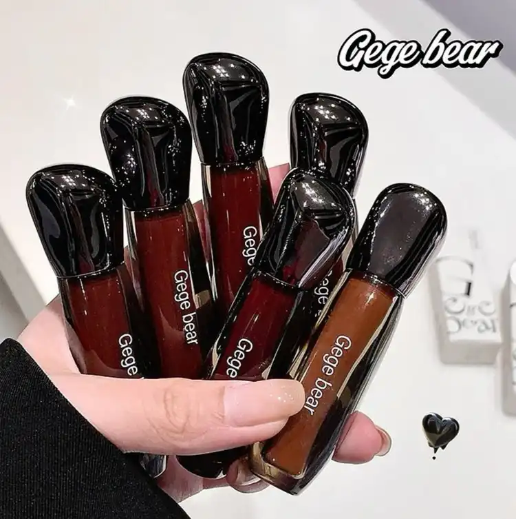 لیپ گلاس خیس پرطرفدار برند Gege beae کد 2325 (کارتن سفید و نارنجی)