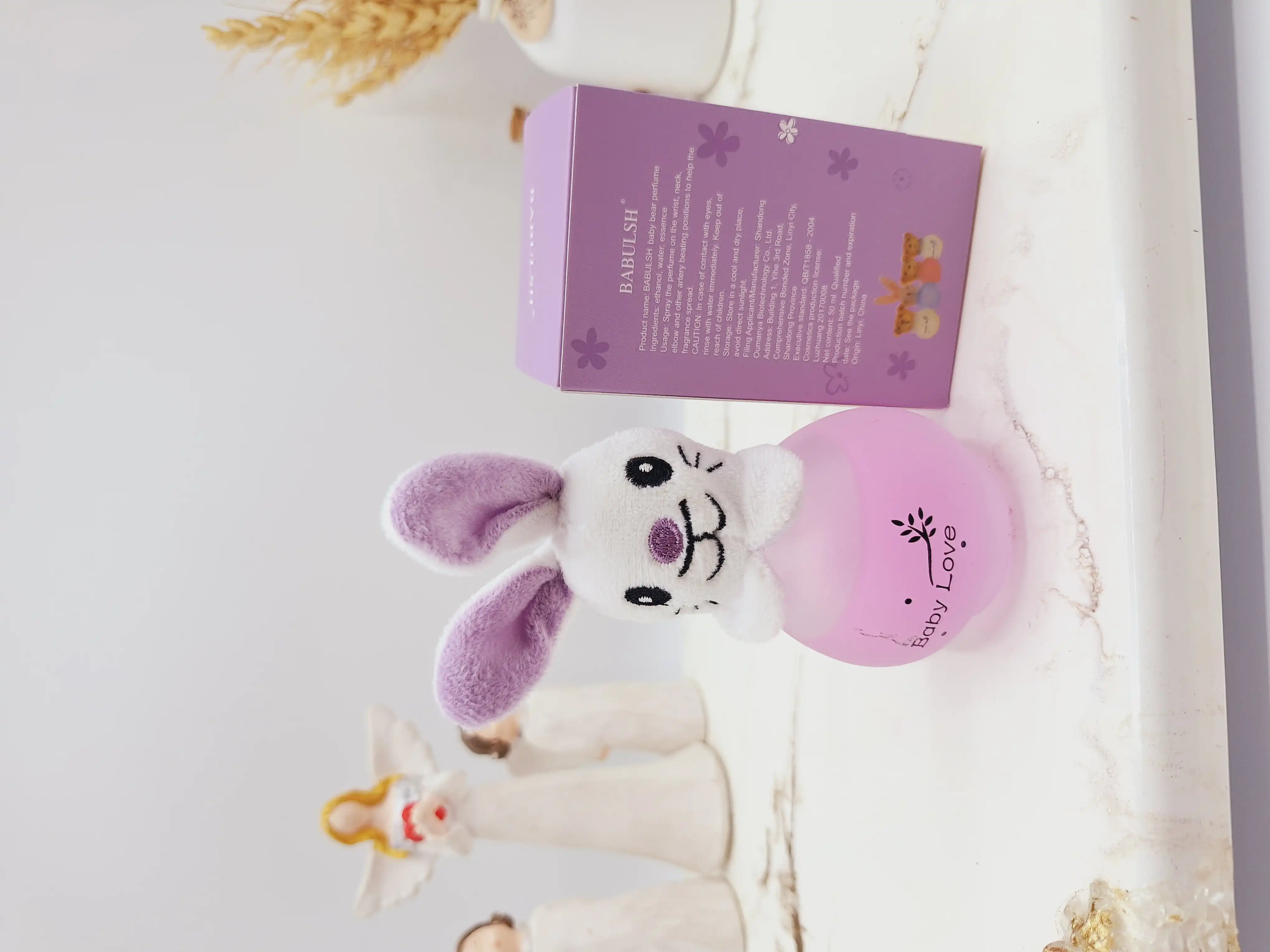 ادکلن عروسکی کودک مدل خرگوش بنفش حجم 50 میل کدOMY-X190