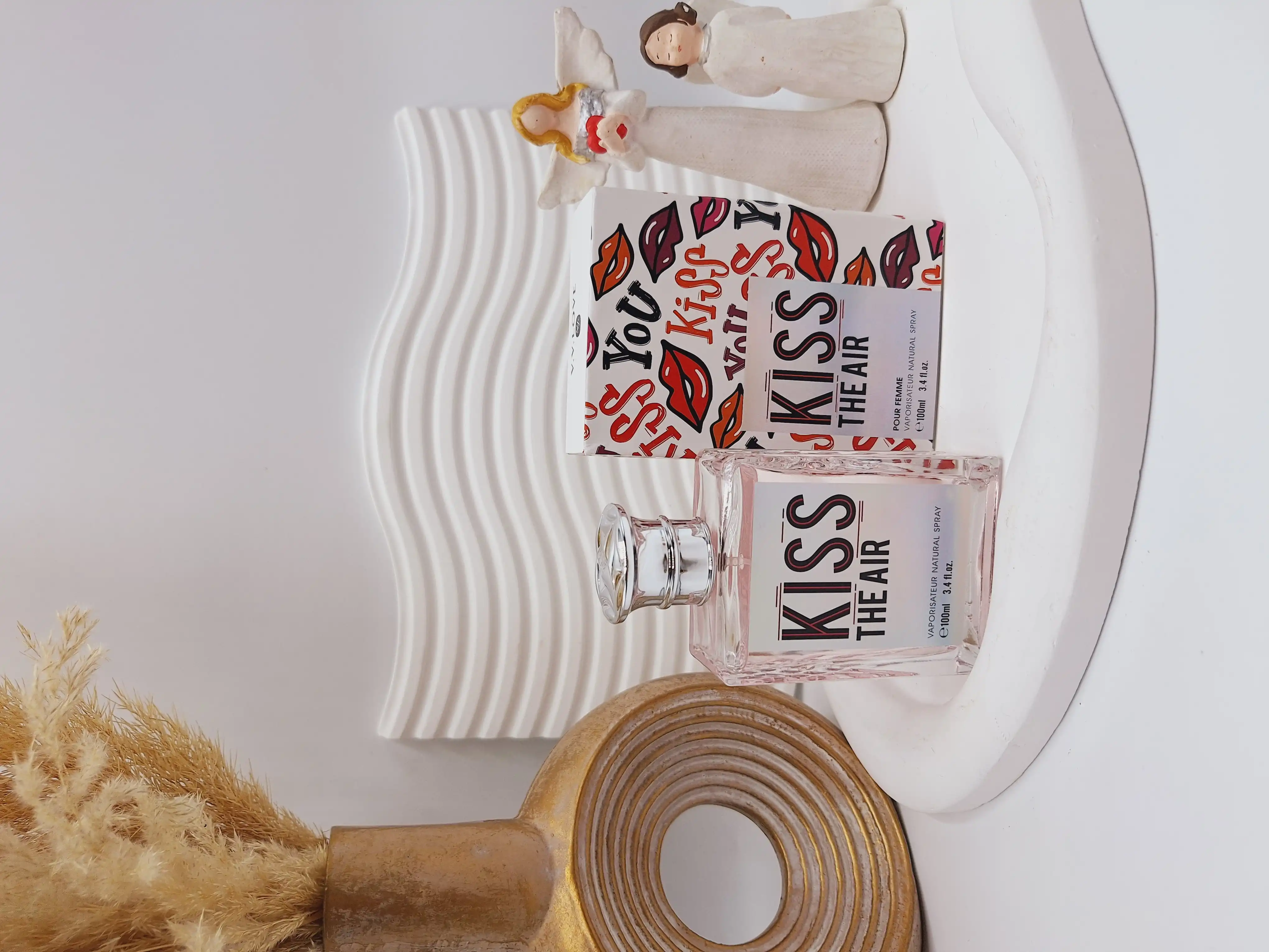 ادکلن زنانه KISS THE AIR حجم 100 میل کد 9385