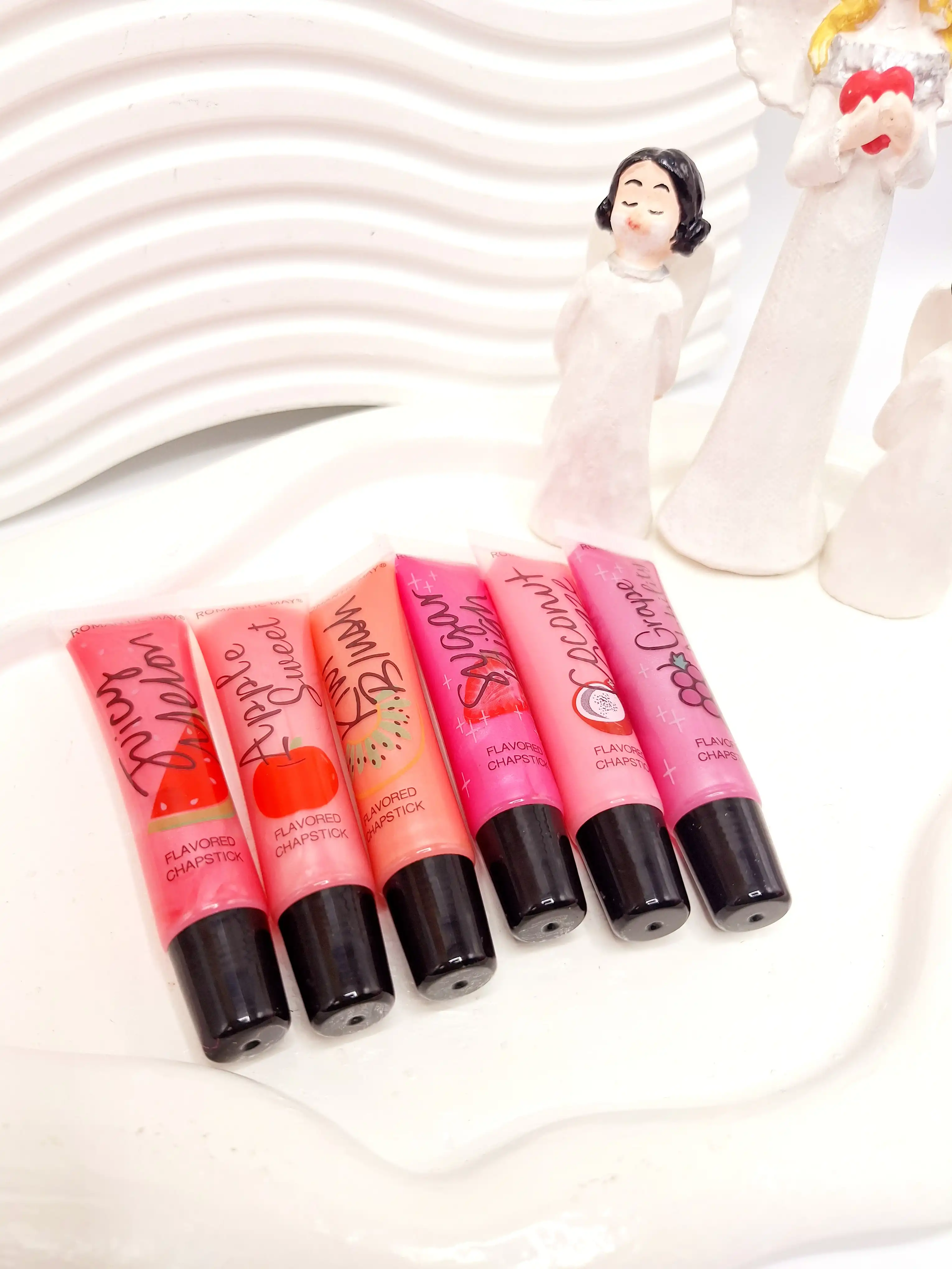 لیپ گلاس شاین دار میوه ای تیوپی برند رومانتیک مای کد 626