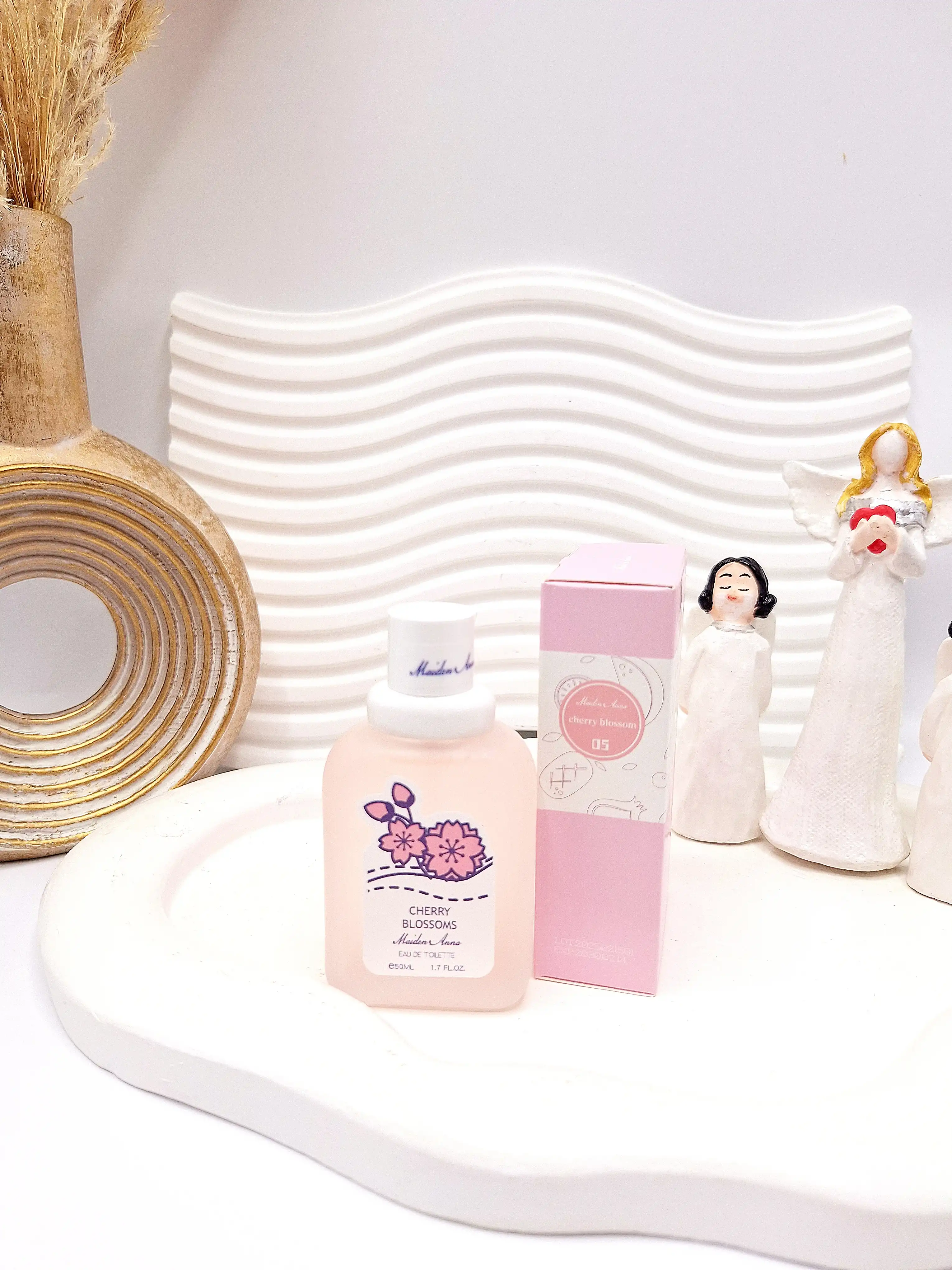 عطر بیکینی رایحه شکوفه گیلاس حجم 50 میل برند میدن آنا کد E188-5