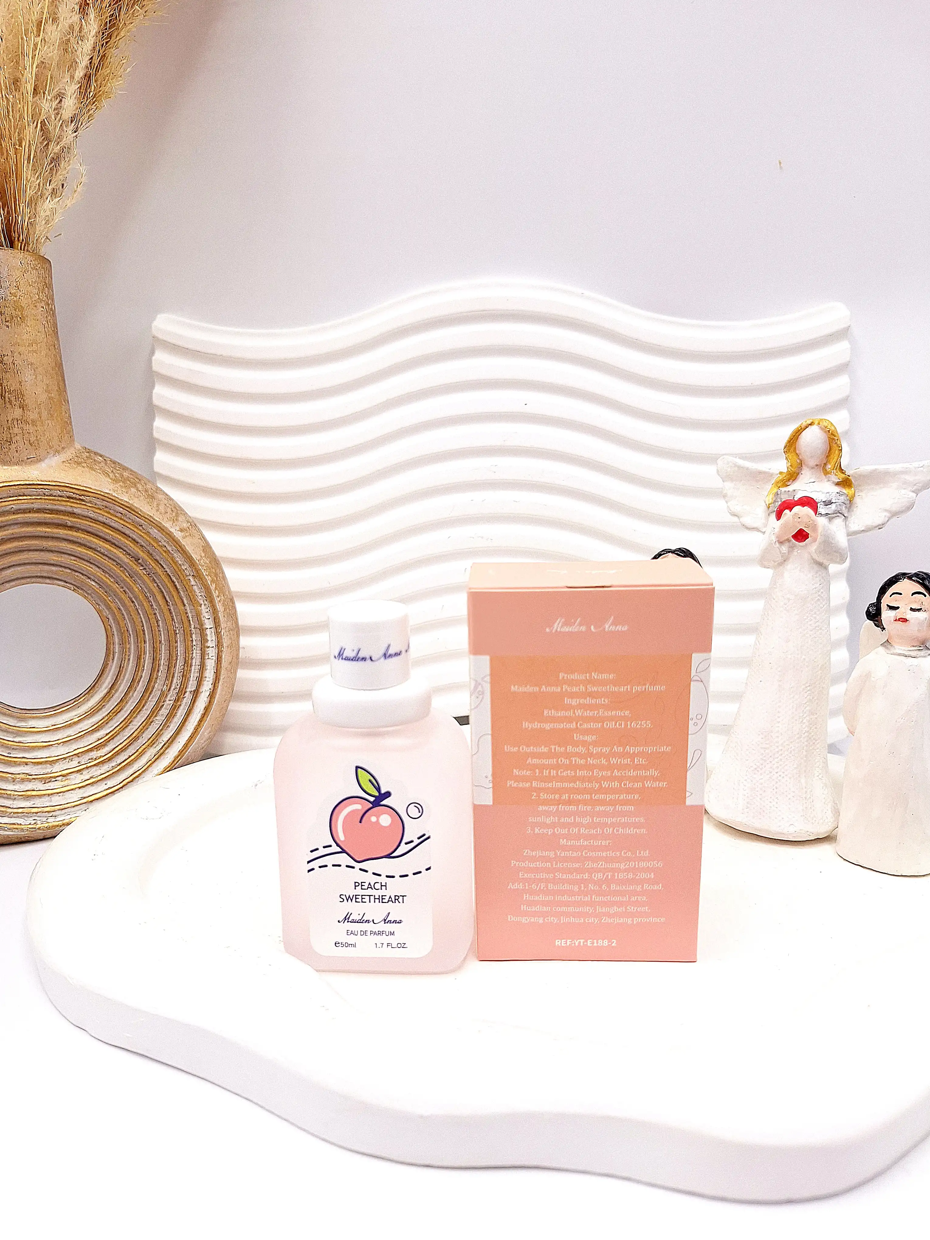 عطر بیکینی رایحه هلو حجم 50 میل برند میدن آنا کد E188-2