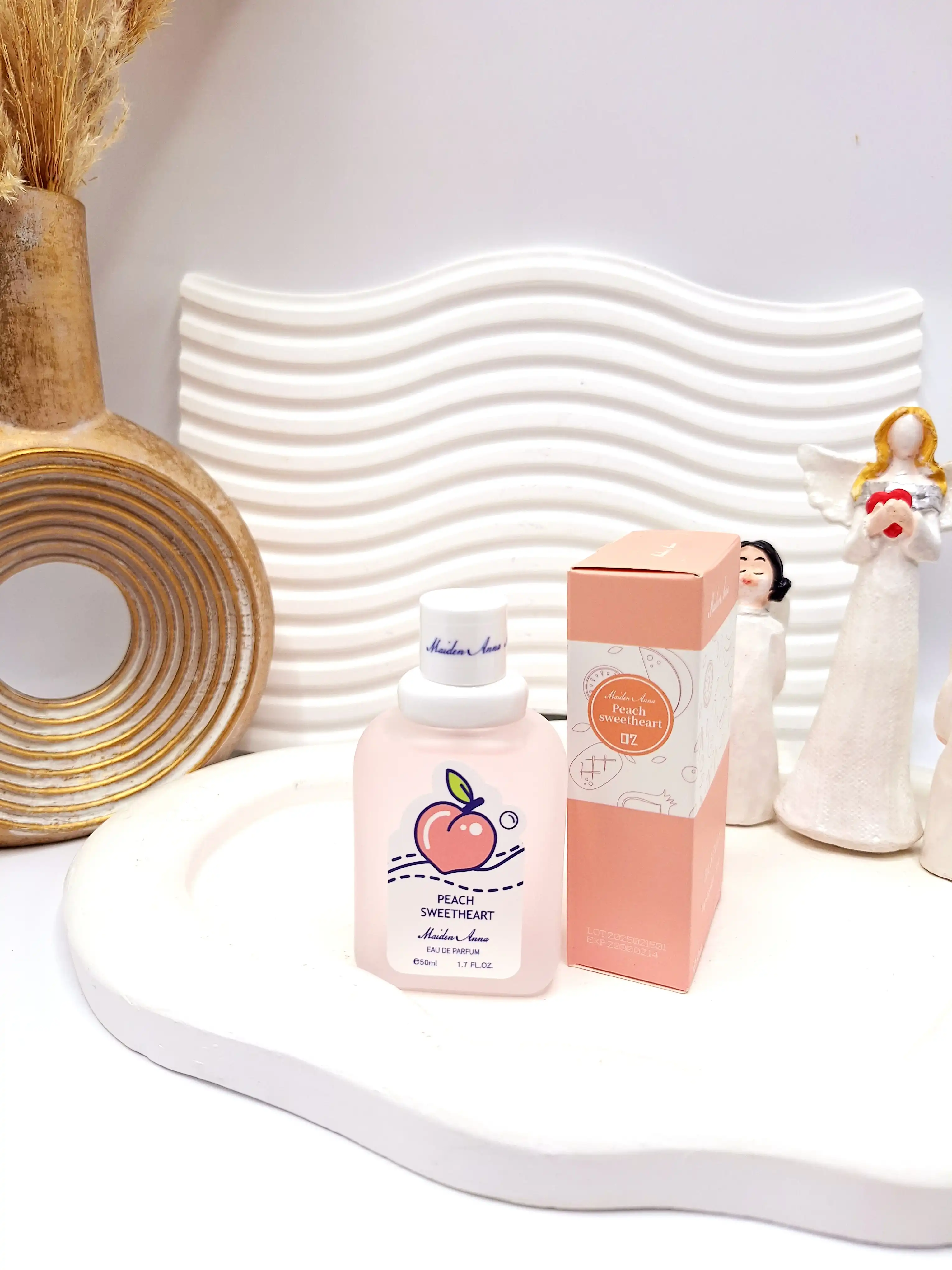 عطر بیکینی رایحه هلو حجم 50 میل برند میدن آنا کد E188-2