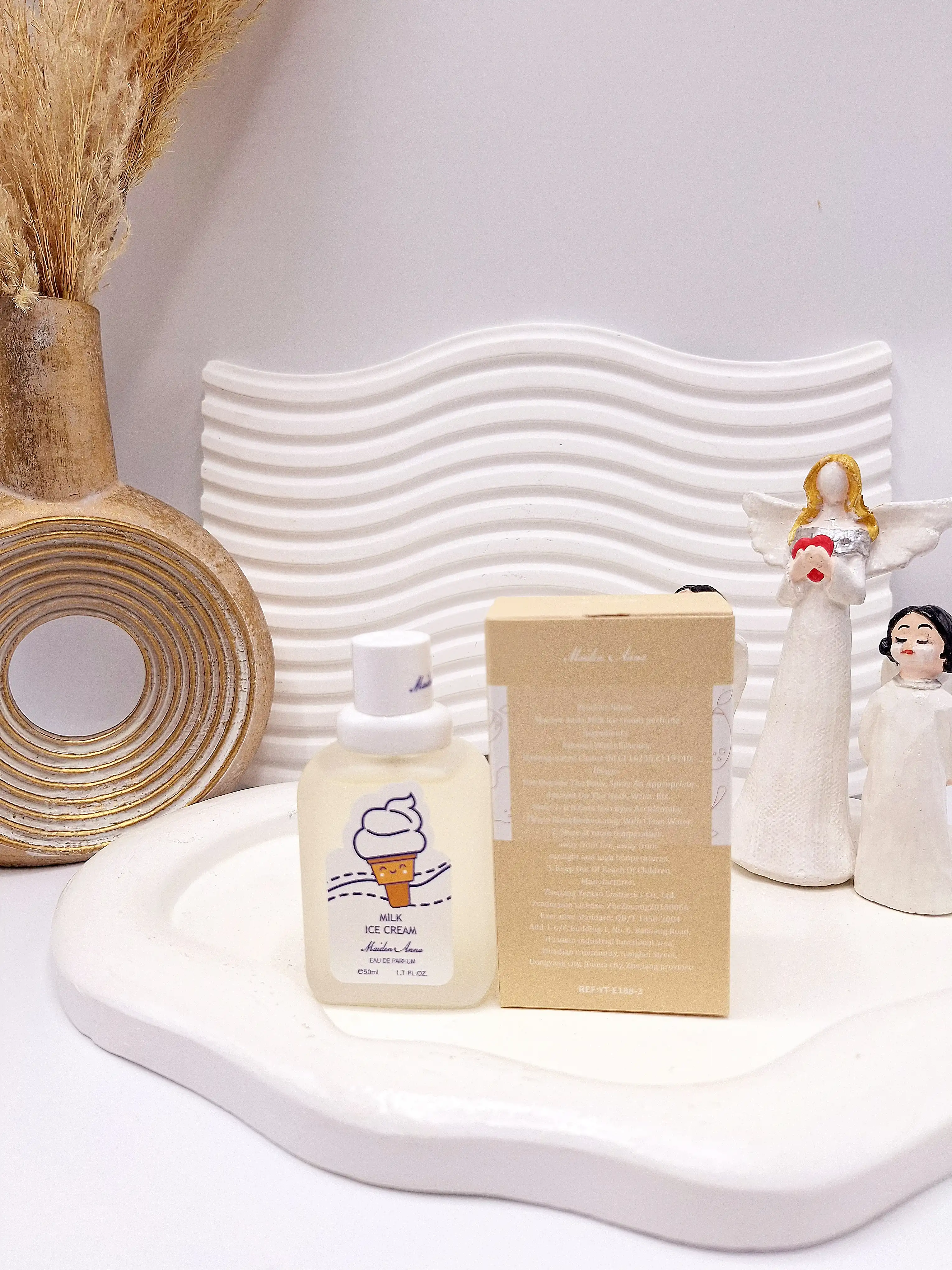 عطر بیکینی رایحه شیر بستنی حجم 50 میل برند میدن آنا کد E188-3