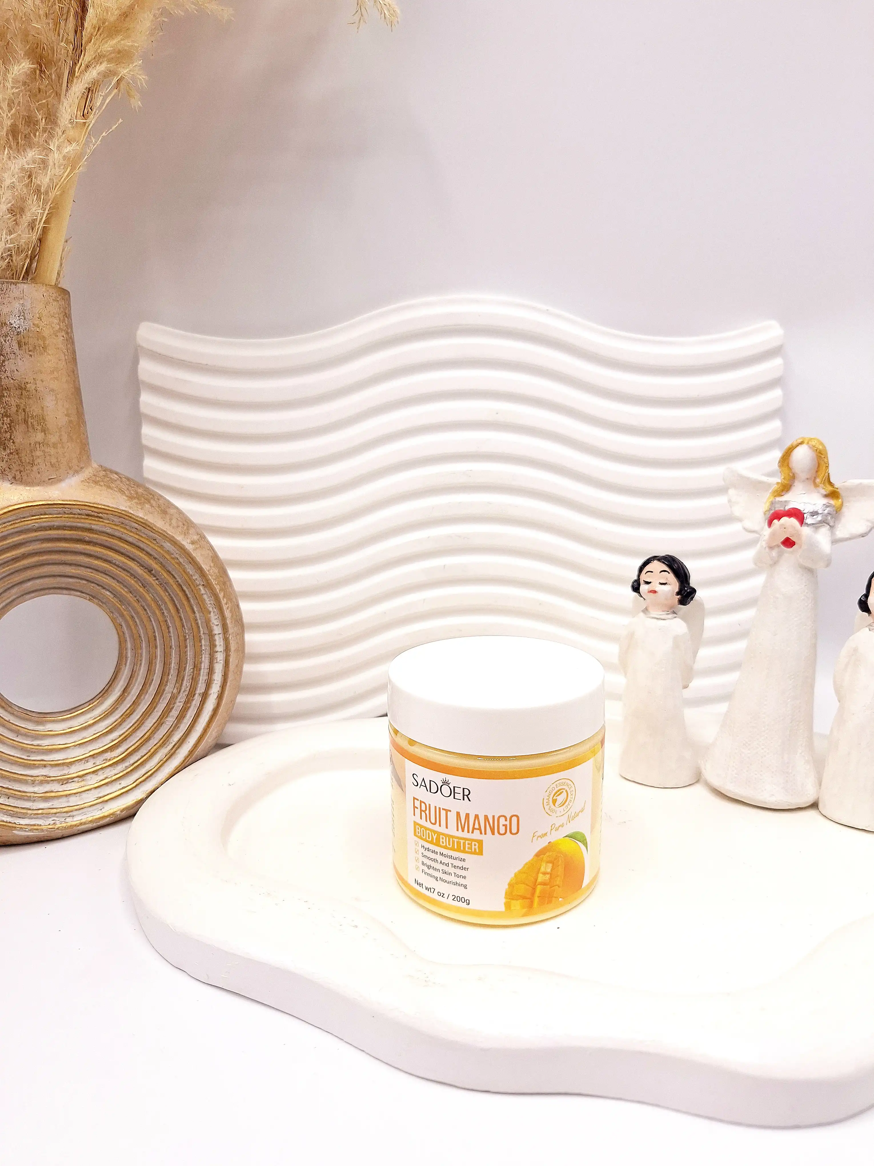 کره بدن رایحه انبه حجم 200 گرم برند sador کد 8021