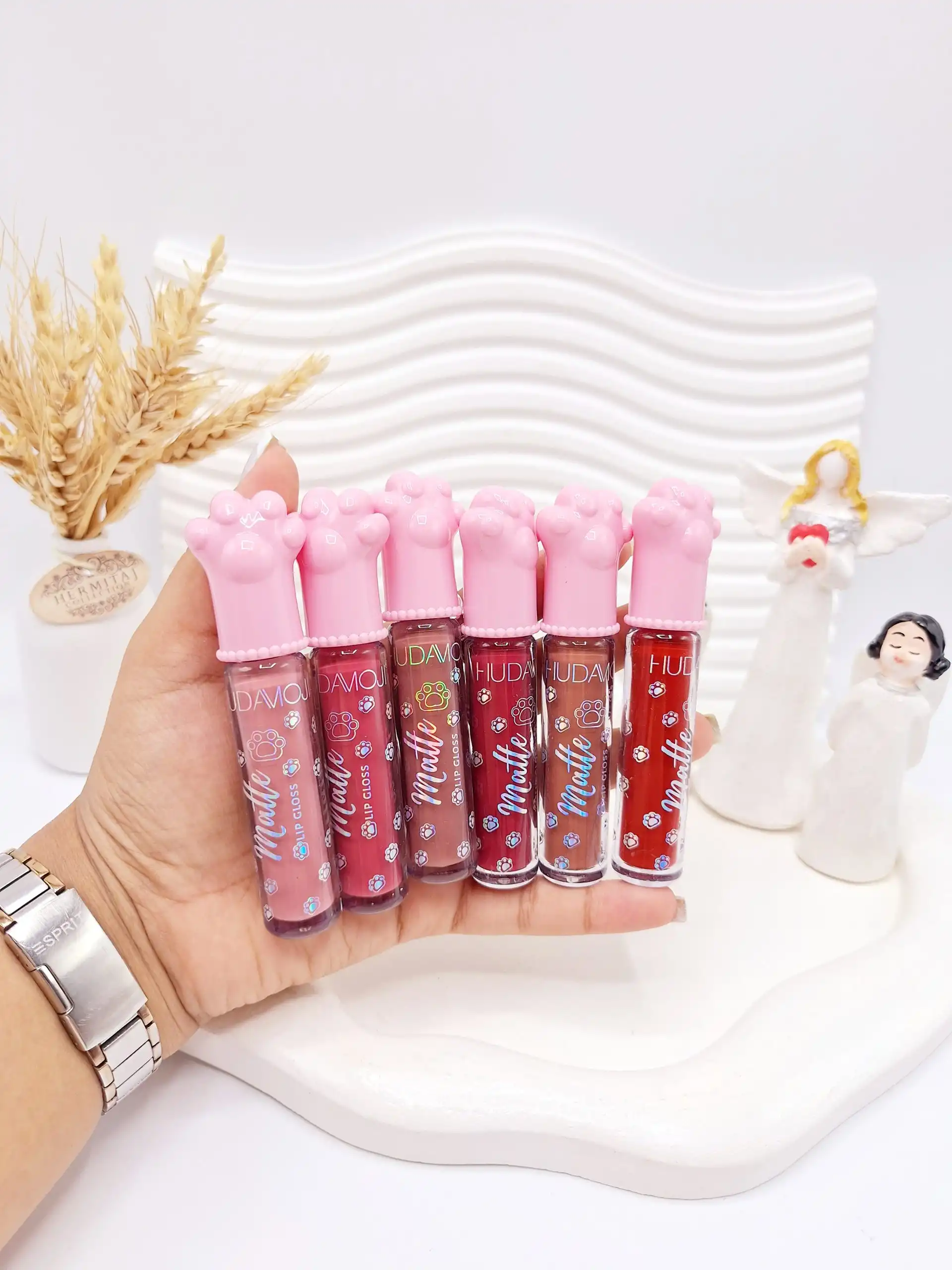 پک 6 تایی رژ مایع طرح پنجه صورتی برند هدا موجی کد 016