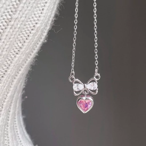 گردنبند زنانه جواهری قلب و پاپیون صورتی استیل