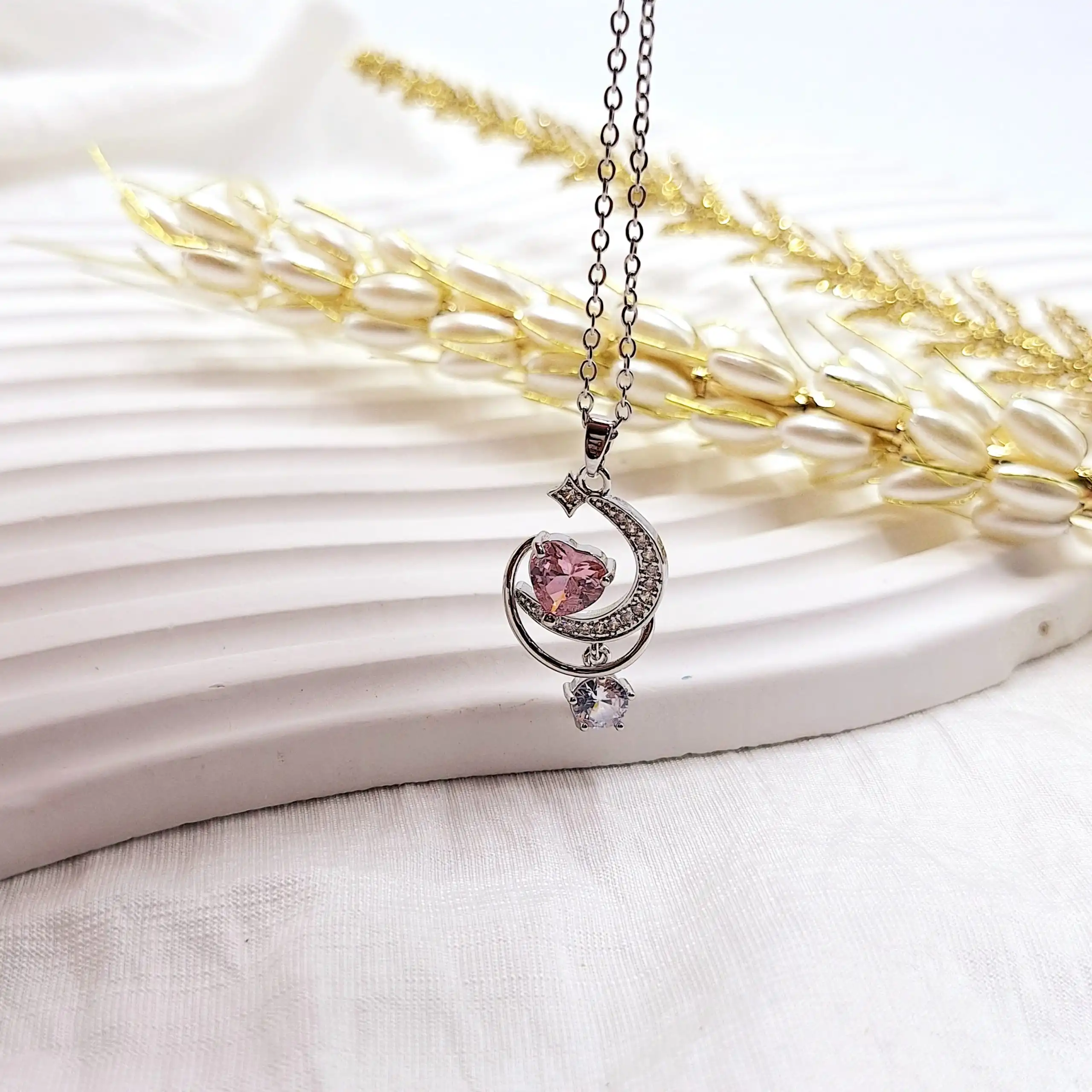 گردنبند زنانه سوارسکی ماه نگینی و قلب صورتی استیل