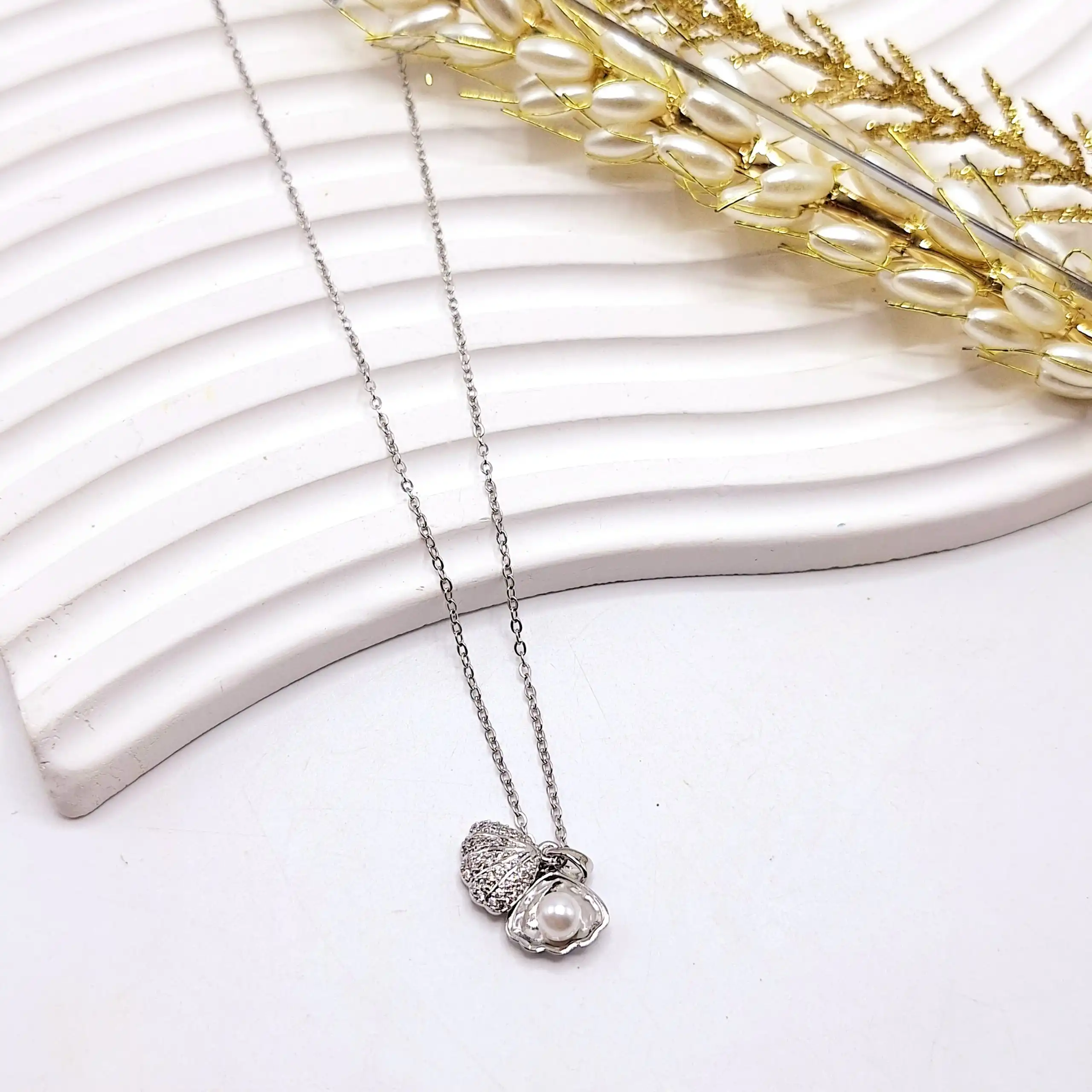 گردنبند زنانه طرح صدف مراوریدی فول نگین استیل