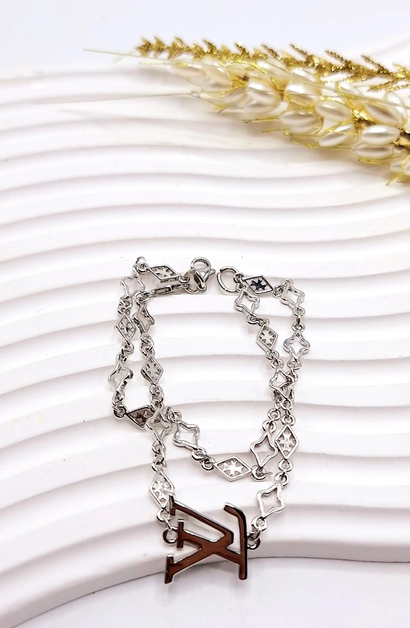 دستبند دو لاین حروف لویی ویتون نقره ای رنگ ثابت استیل