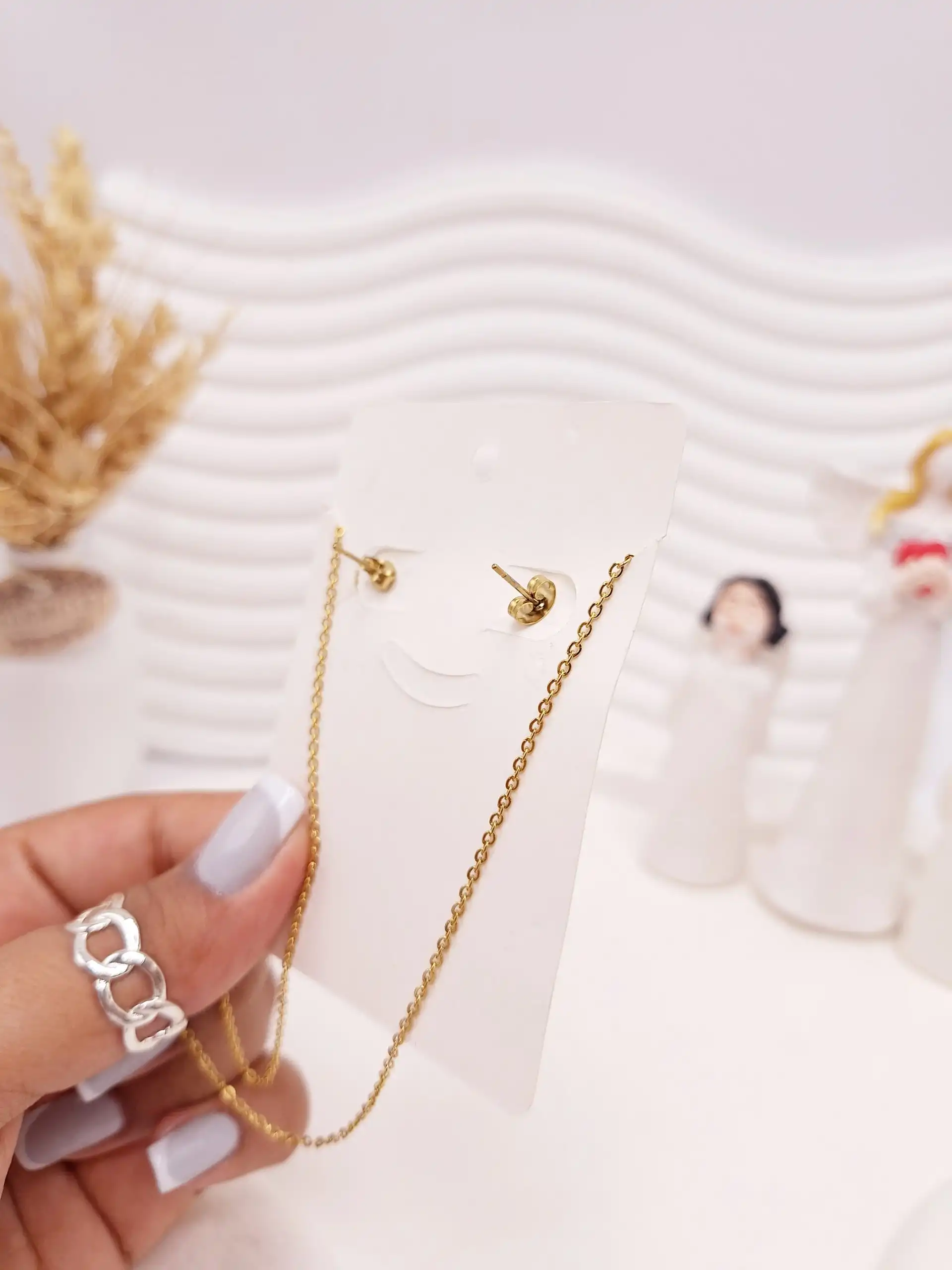 ست گوشواره و گردنبند طرح بی نهایت طلایی استیل