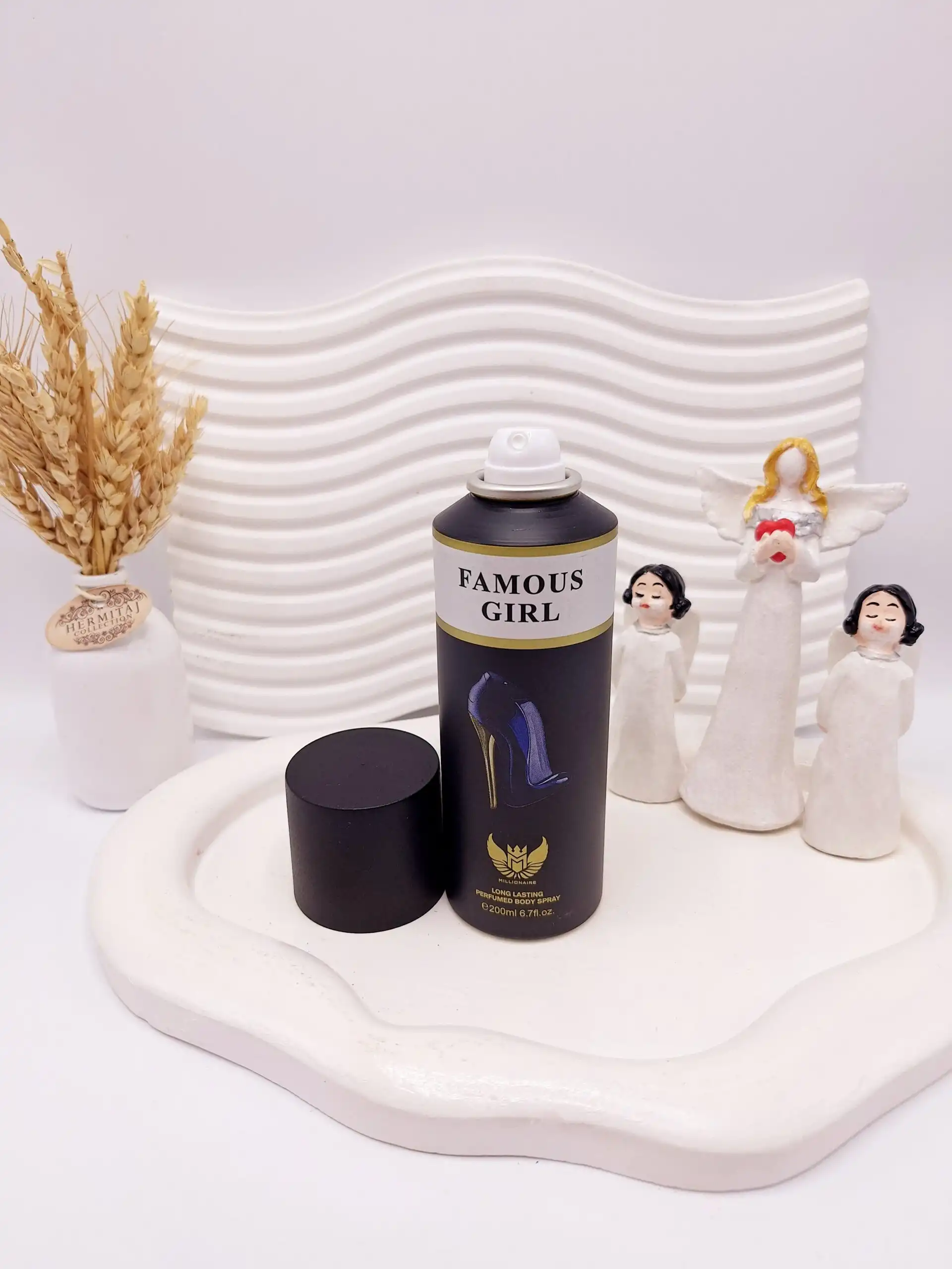 اسپری خوشبو کننده بدن زنانه FAMOUS GIRL کد 7110