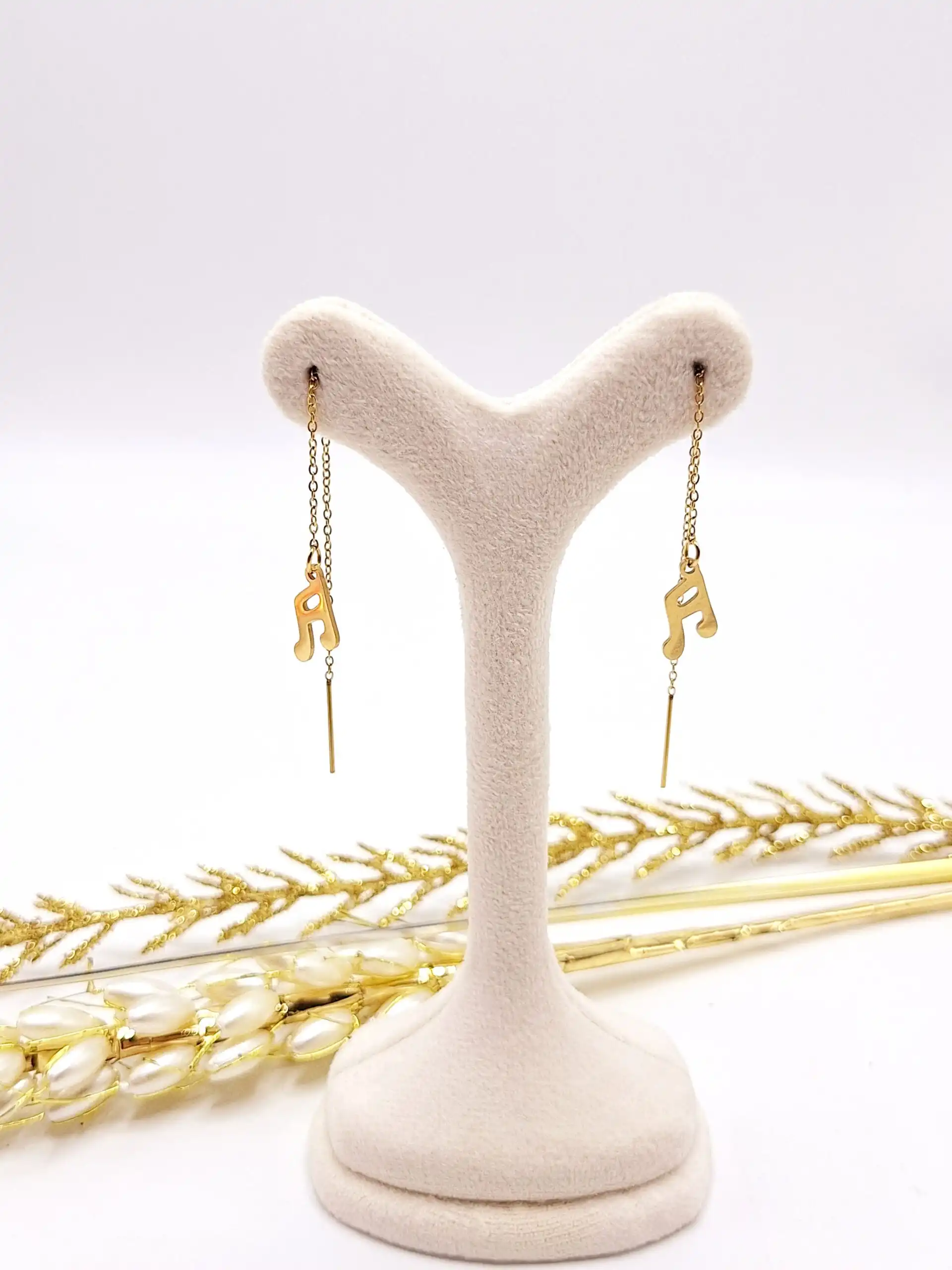 گوشواره بخیه ای طرح رندم طلایی