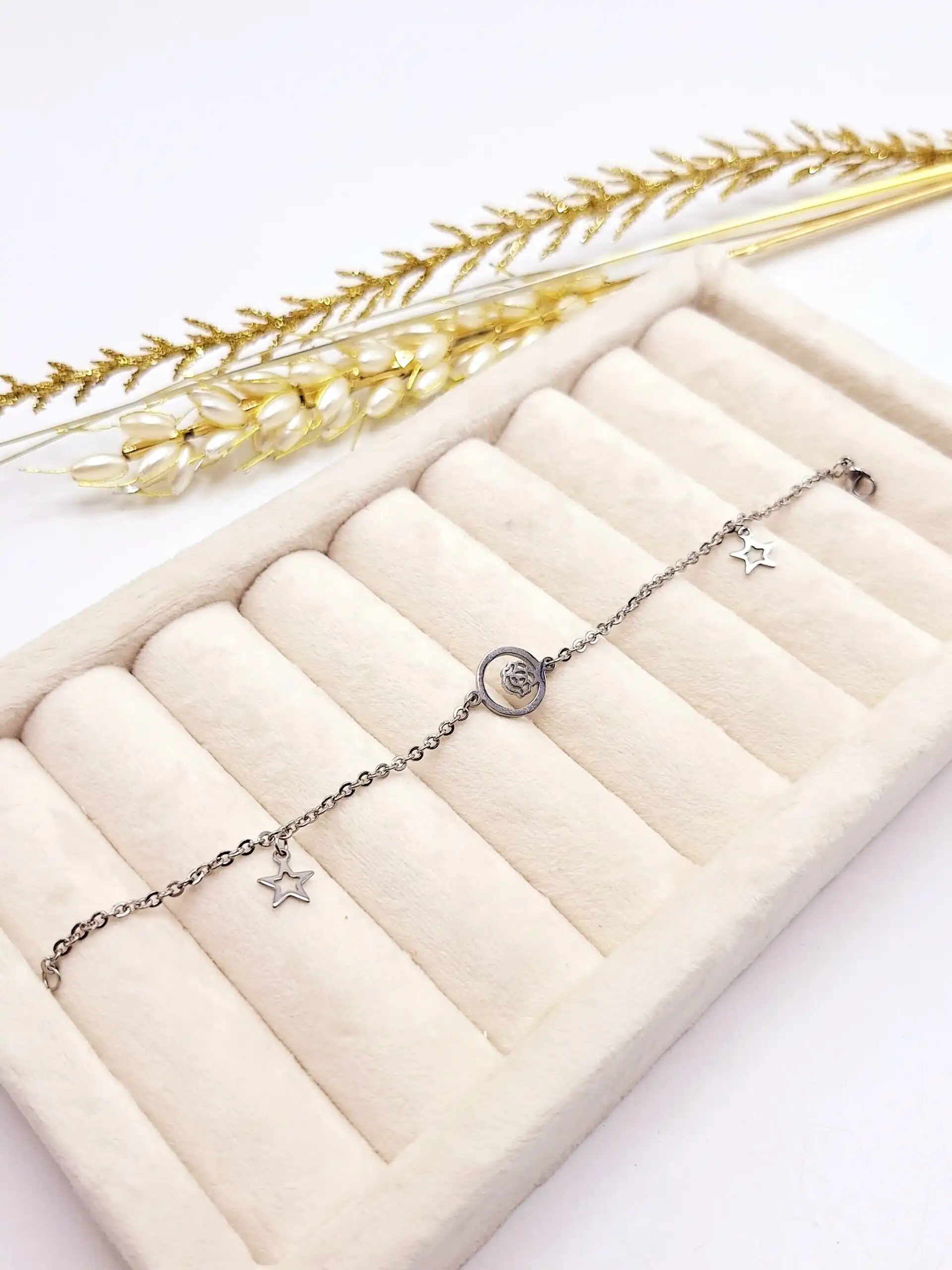 دستبند زنجیری طرح گلبرگ و ستاره استیل