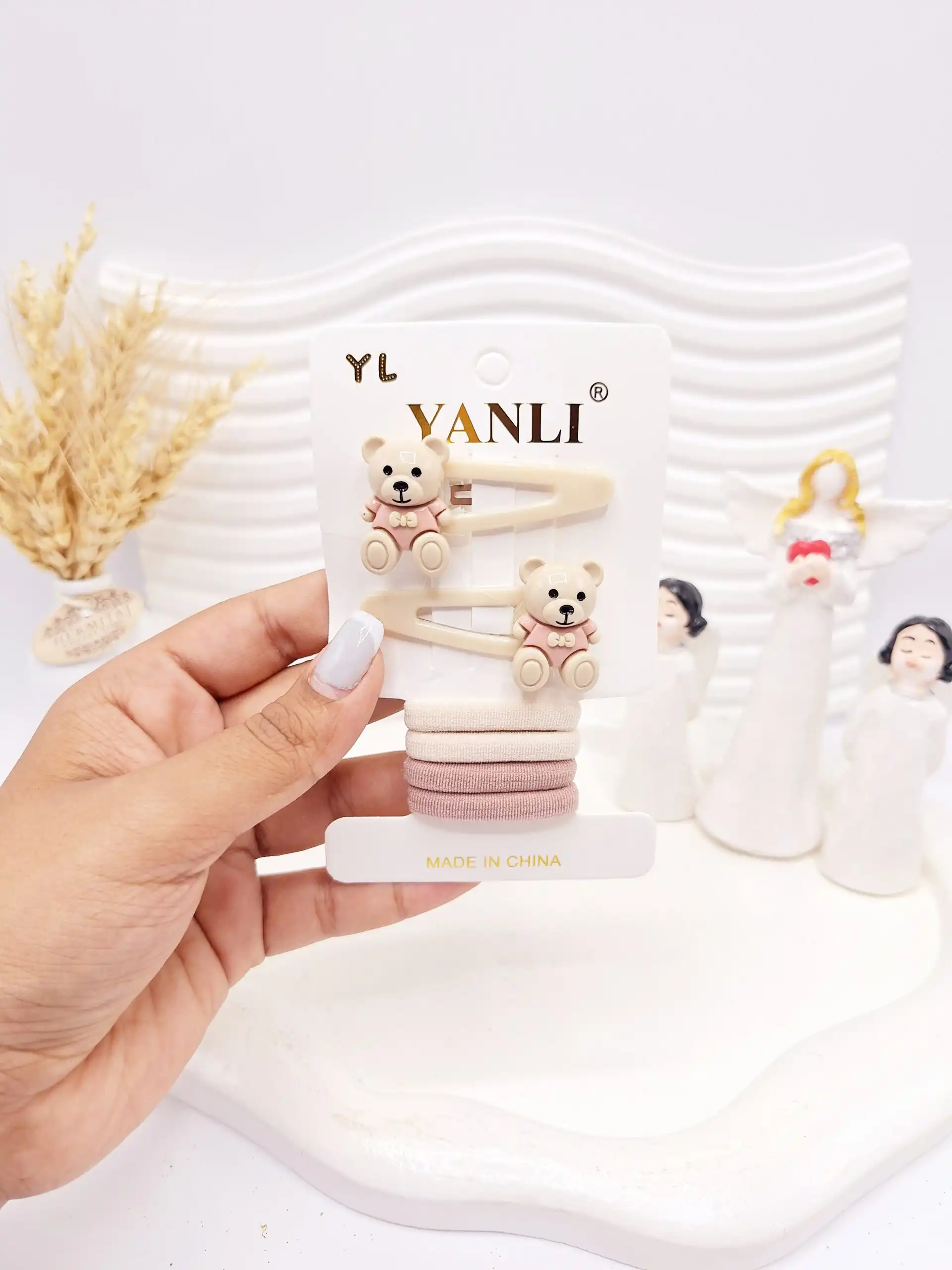 ست کش و پنس مو خرسی صورتی و نود