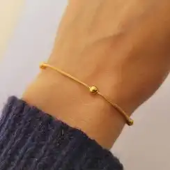 دستبند زنجیری توپی طلایی