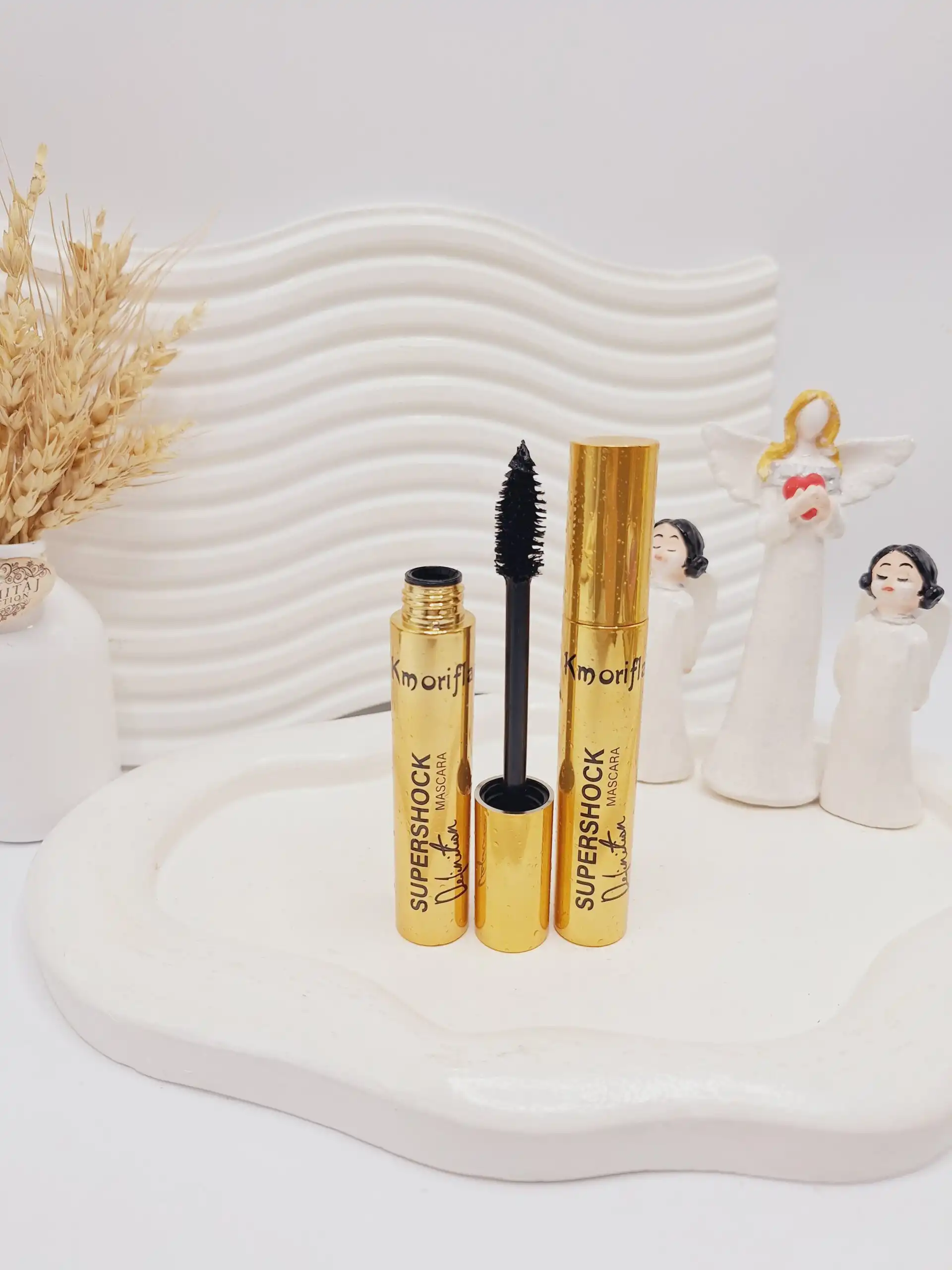 ریمل سوپر شوک پرپشت کننده و حجم دهنده مژه پوکه طلایی کد 0259