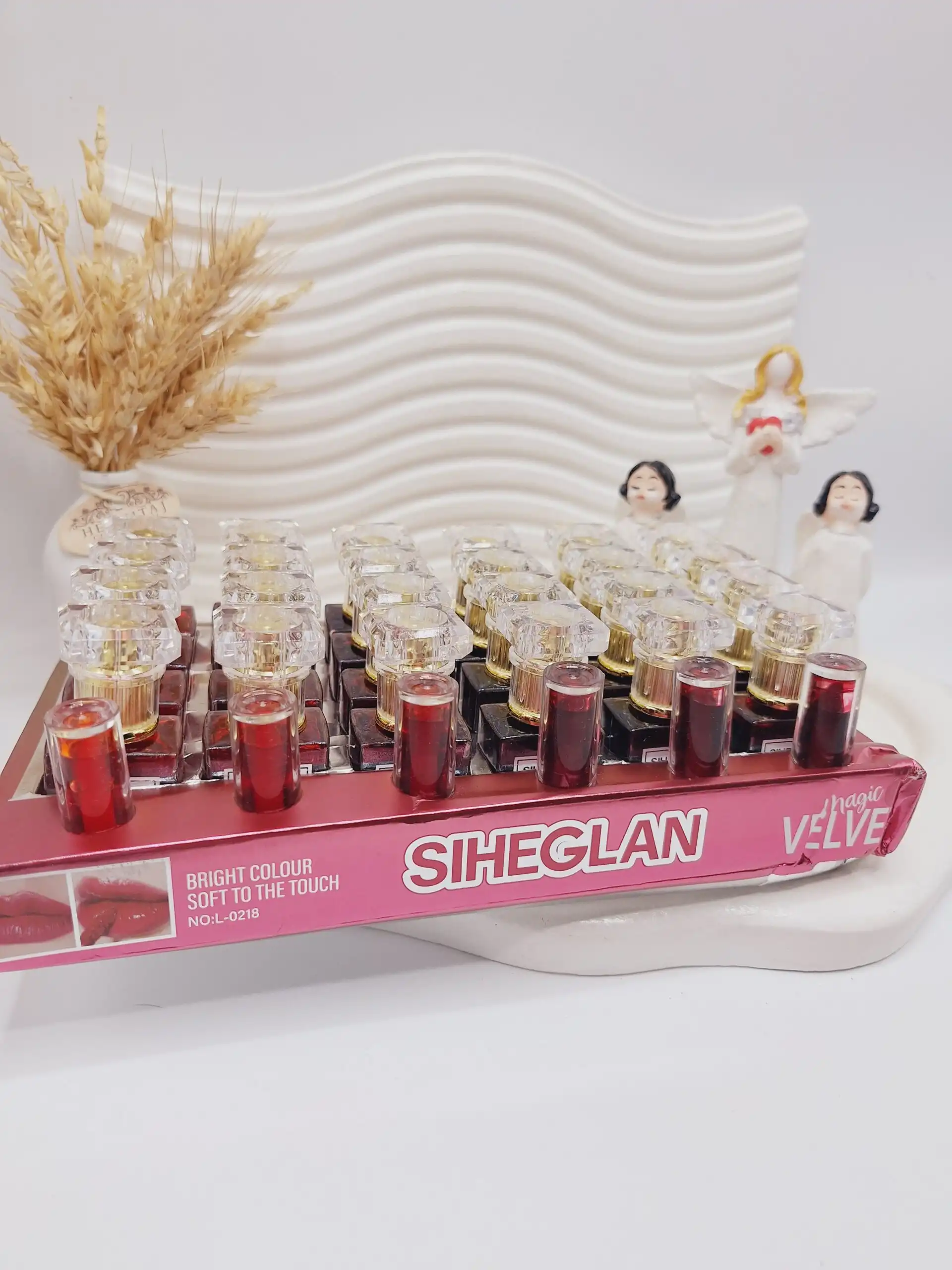 تینت لب جذاب ادکلنی برند SIHEGLAN کد L_0218