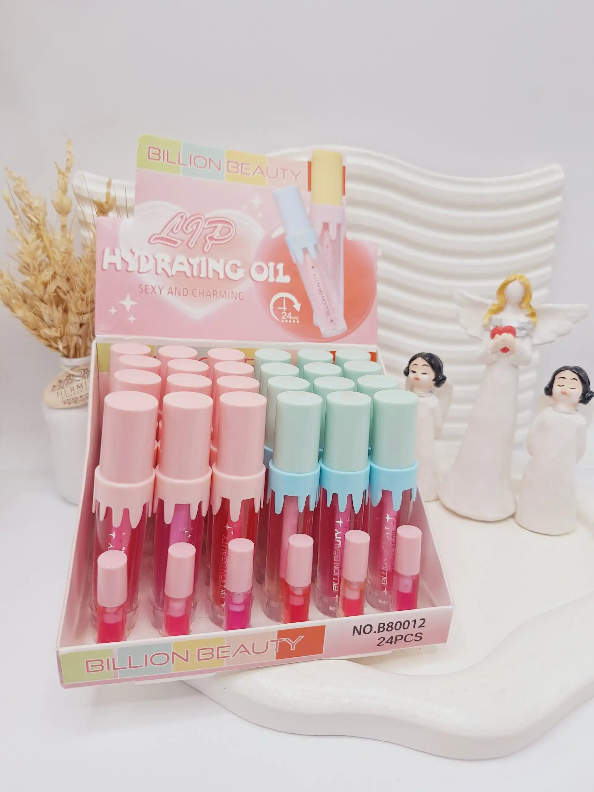 لیپ گلاس جذاب آیس پکی برند BILLION BEAUTY کد B80012