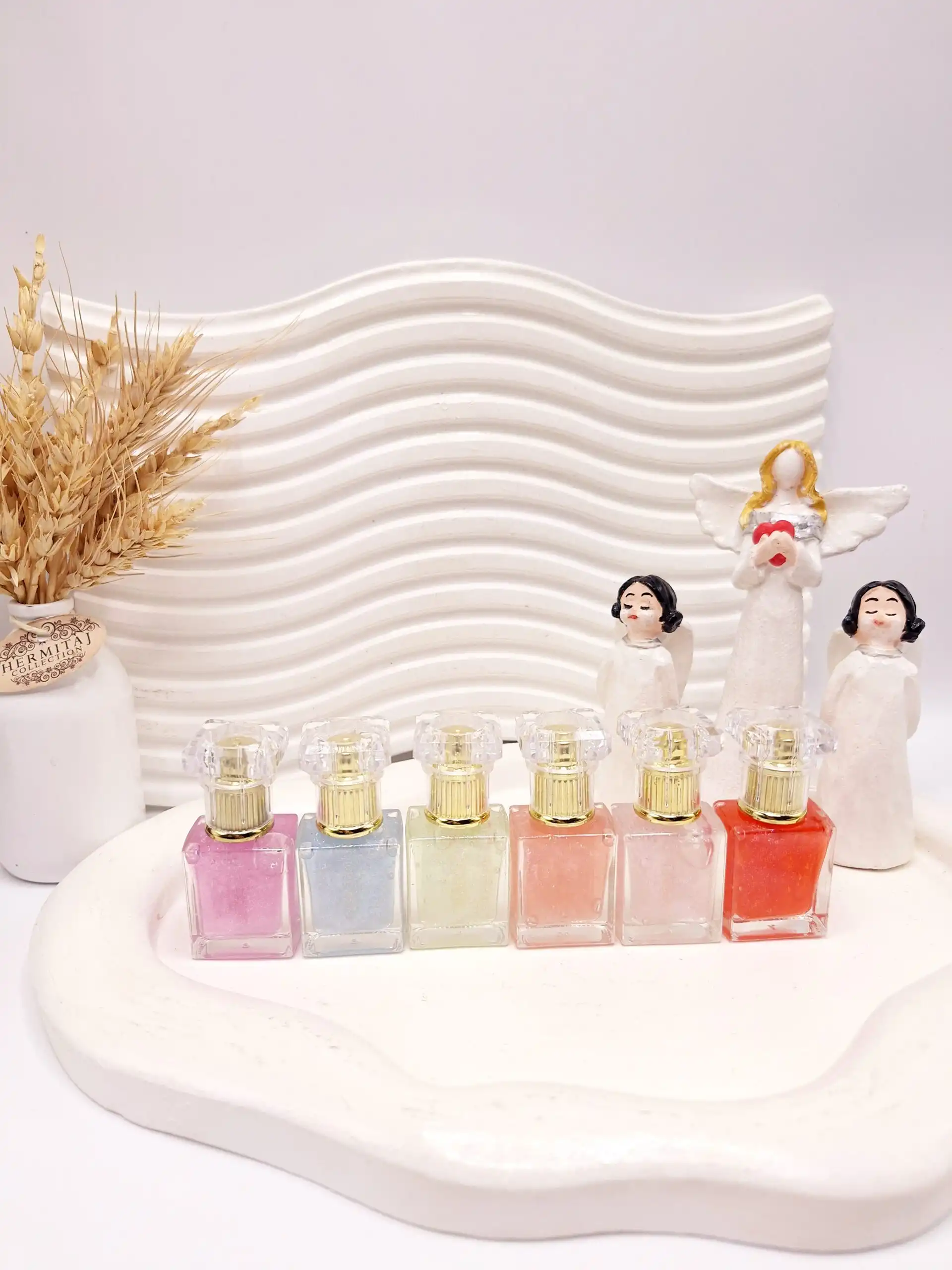 لیپ گلاس شاین دار جذاب ادکلنی برند SIHEGLAN کد L_0218